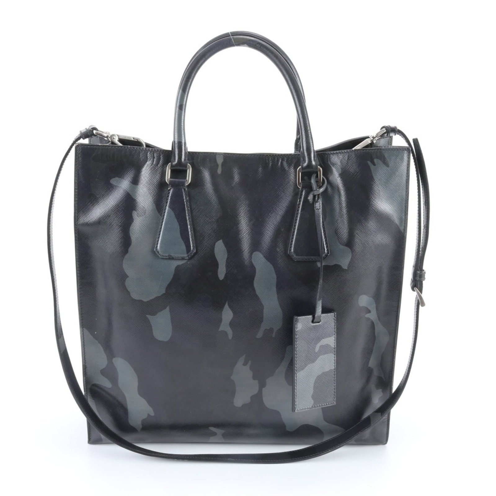 Prada Shoulder Bag Tote Bag Leather: Prada Shoulder Bag Tote Bag Leather This black Prada leather shoulder bag tote features a classic design with clean lines and a timeless silhouette. With its durable construction and high-quality leat