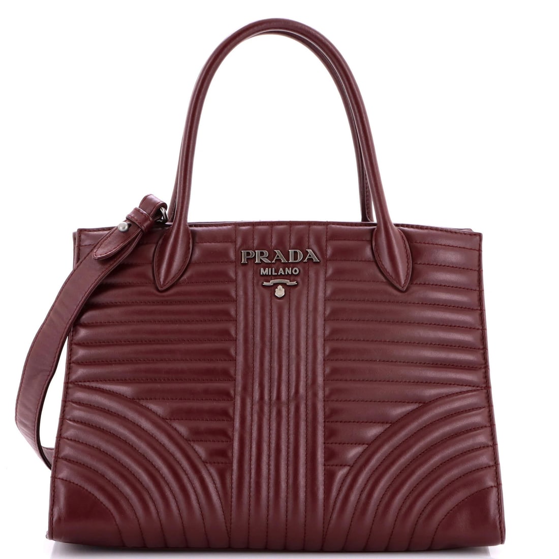 Quilted Leather Diagramme Open Convertible Medium Tote Prada: Quilted Leather Diagramme Open Convertible Medium Tote Prada The Prada Diagramme Quilted Leather Medium Tote features a striking red exterior with quilted leather detailing, showcasing the brand's