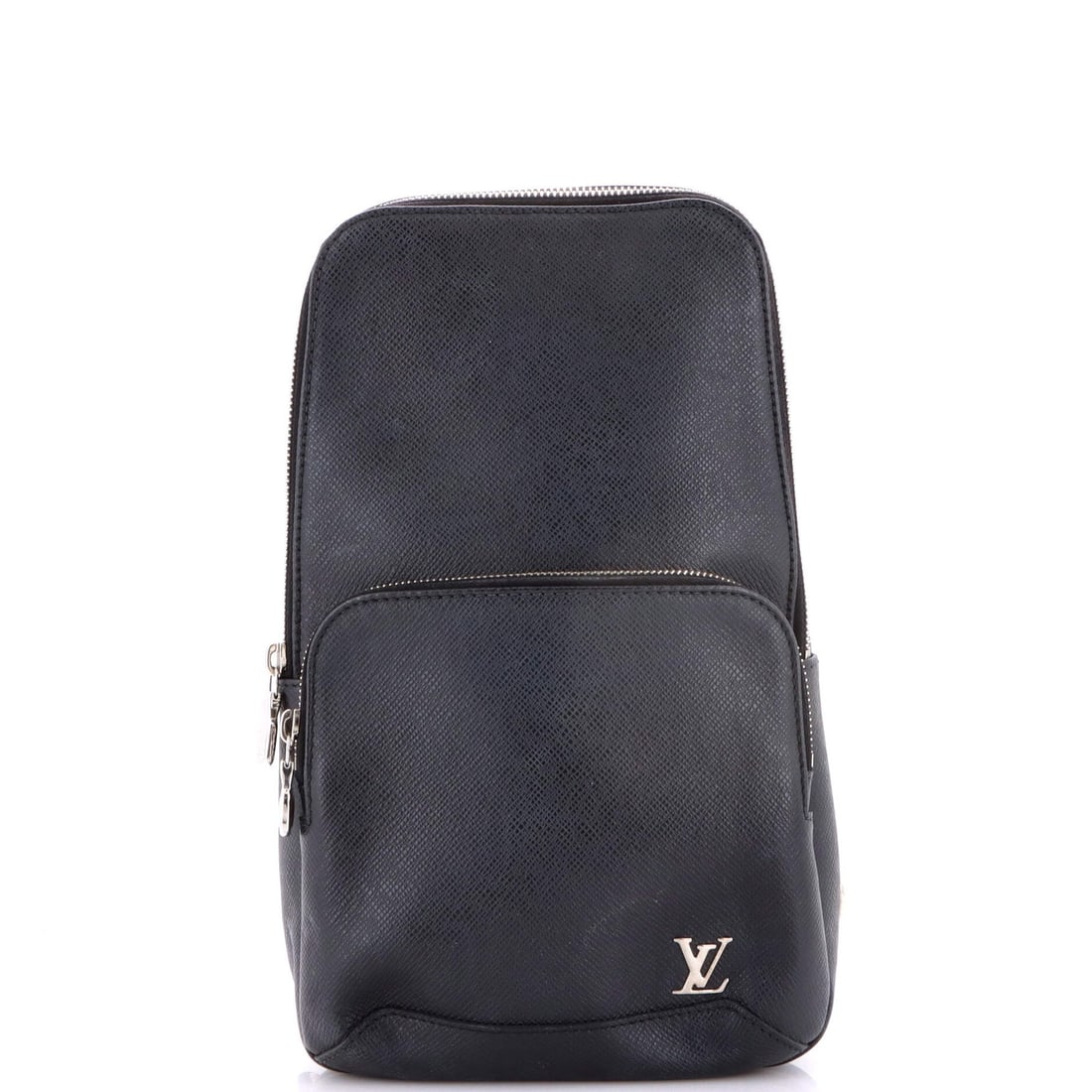 Leather Taiga Sling Bag: Leather Taiga Sling Bag The Louis Vuitton Avenue Sling Bag Taiga Leather features a classic cross body design with heavy corner wear and scuffs on its black exterior. The bag's interior is lined in bl