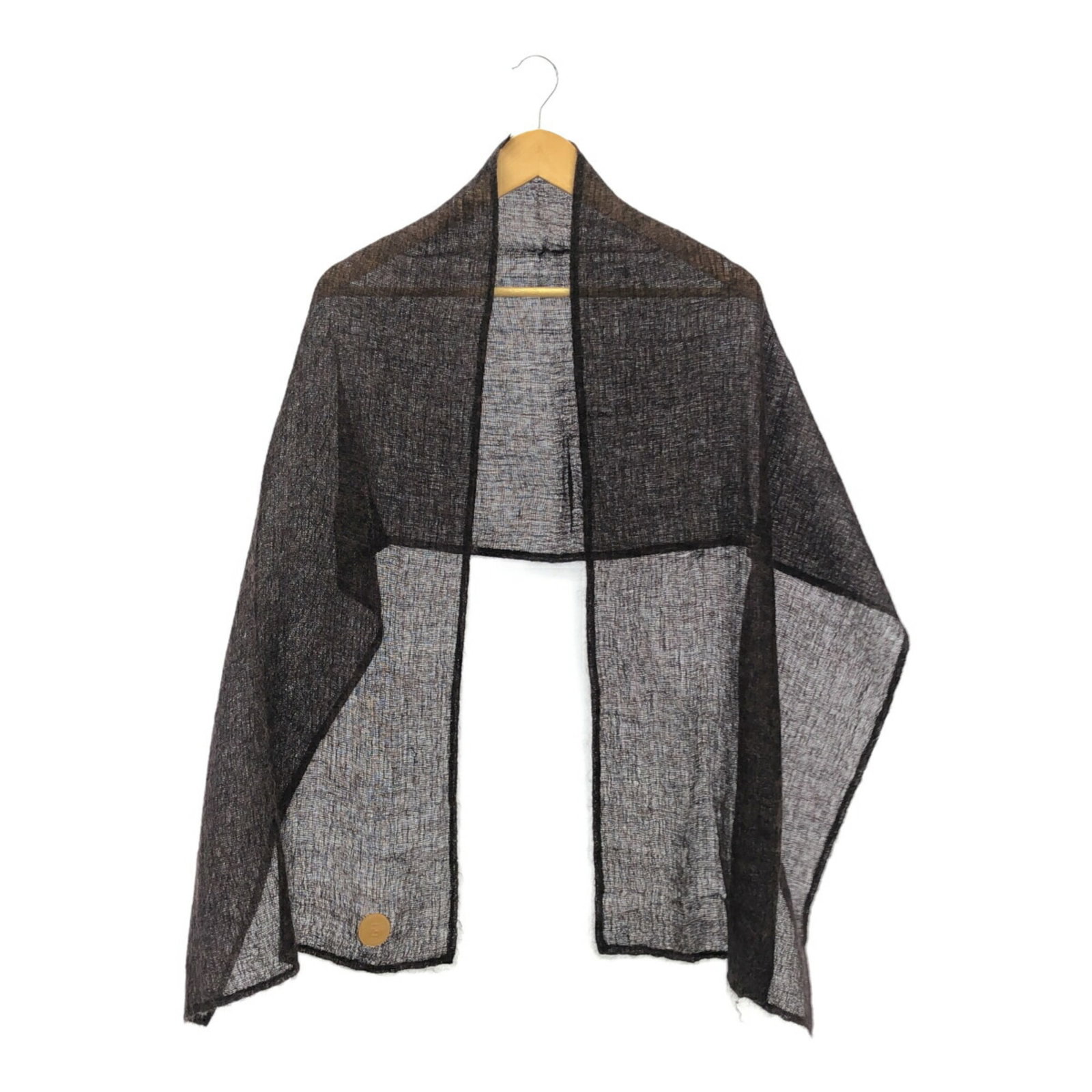 Fendi Stole Mohair: Fendi Stole Mohair The Fendi stole mohair features a striking black and brown color combination, showcasing its unique fall/winter style. Made from high-quality mohair material, this casual accessory 