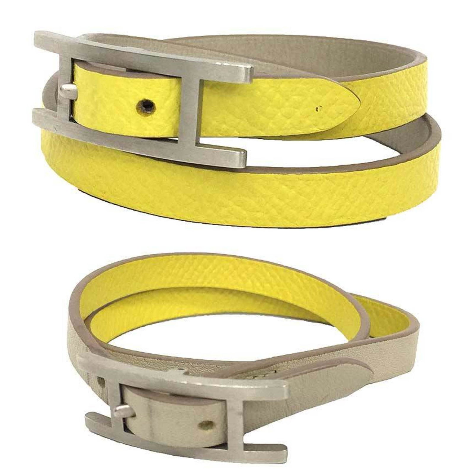 Hermes Charm Bracelet Leather: Hermes Charm Bracelet Leather Used Hermes Charm Bracelet Leather in very good condition. This ivory and matte silver charm bracelet features a few traces of usage, some scratches / dirt visible, but o