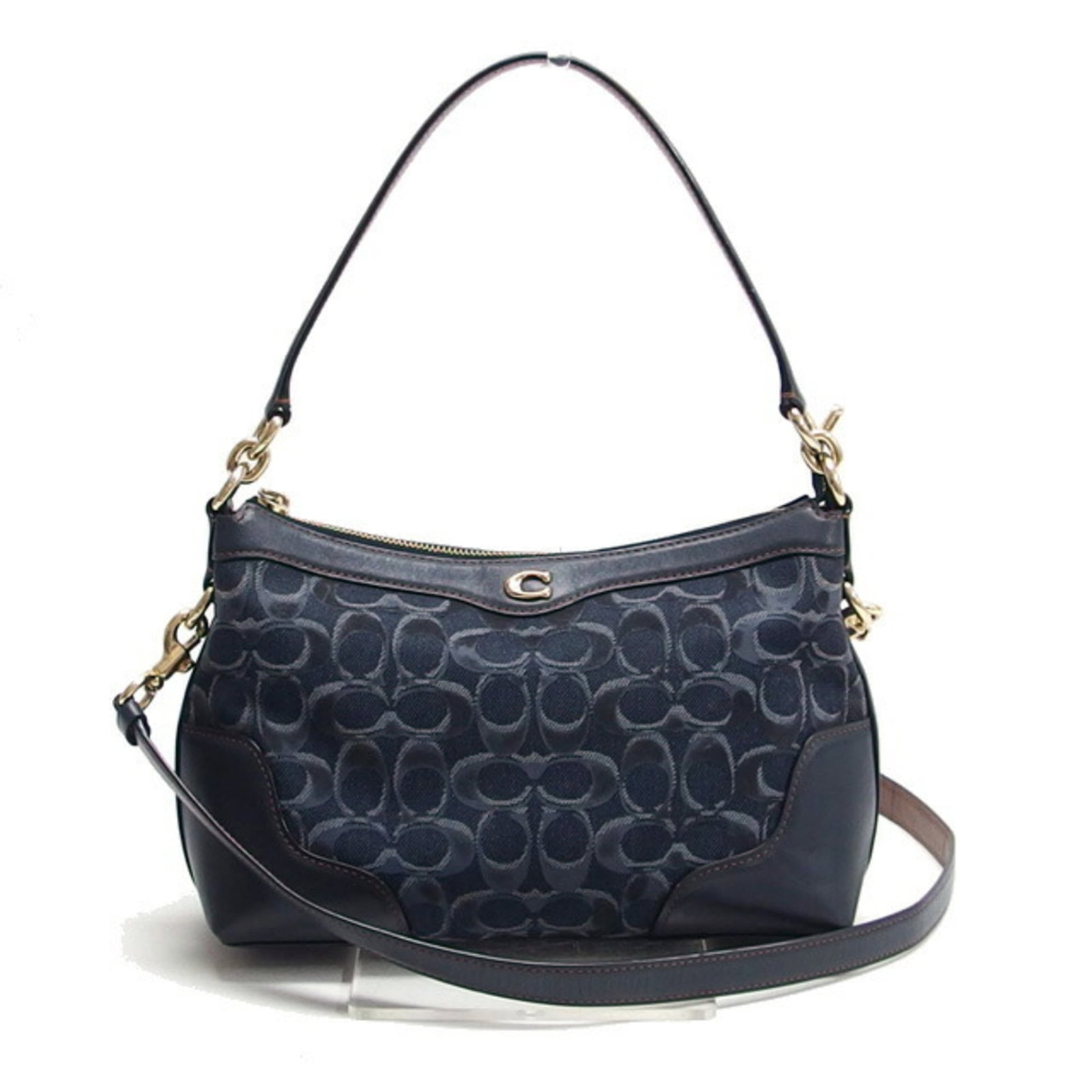 Coach Handbag Shoulder Bag Denim Canvas: Coach Handbag Shoulder Bag Denim Canvas Dark navy denim canvas shoulder bag from Coach, featuring a casual style with a classic design. The bag has some traces of usage and minor damages, but remains 
