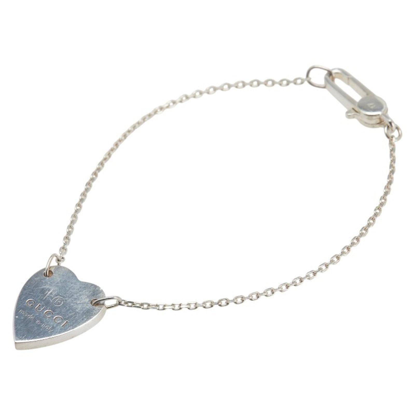 Gucci Charm Bracelet Metal: Gucci Charm Bracelet Metal Silver Gucci Charm Bracelet with Traces of Usage. This used metal charm bracelet features a silver finish and measures 17cm in length, with a total length of 17.5cm when inc