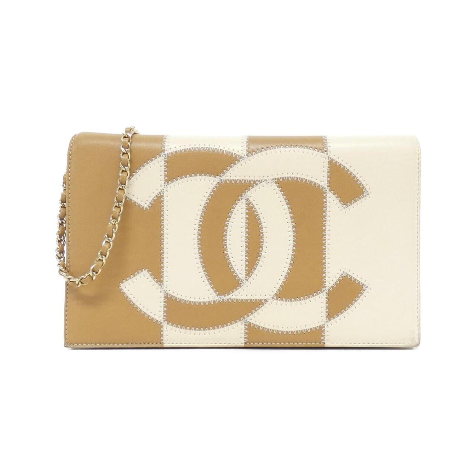 Chanel Shoulder Bag Leather: Chanel Shoulder Bag Leather The Chanel Shoulder Bag Leather is a classic design with a timeless look. Made from high-quality lambskin leather, this beige and ivory shoulder bag features a sleek and