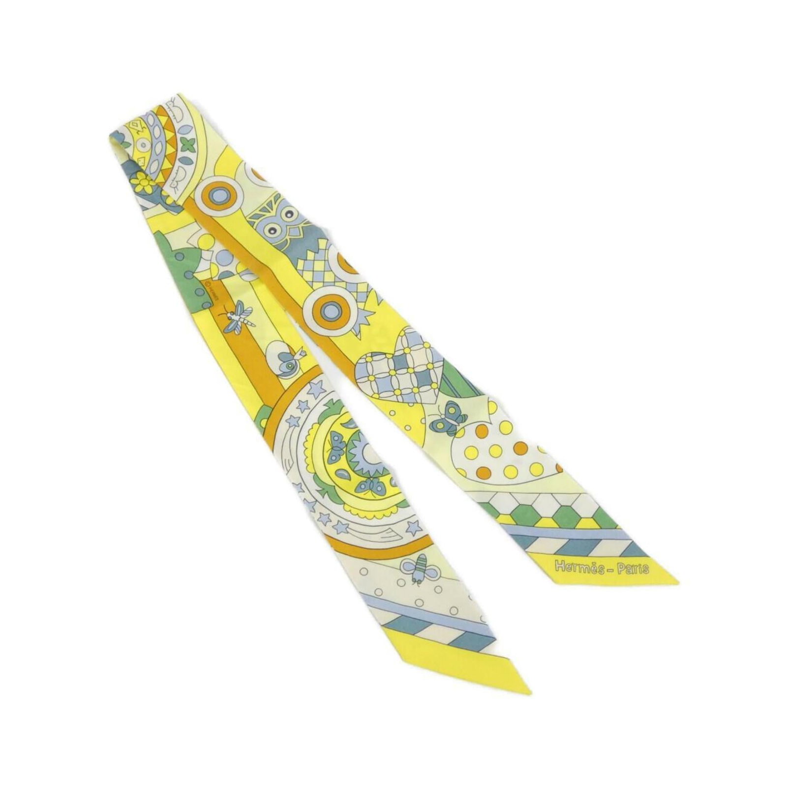 Hermes Scarf Silk: Hermes Scarf Silk Yellow silk scarf from Hermes in excellent condition, with only minor signs of wear and some scratches visible. The scarf's vibrant color remains intact, showcasing the timeless