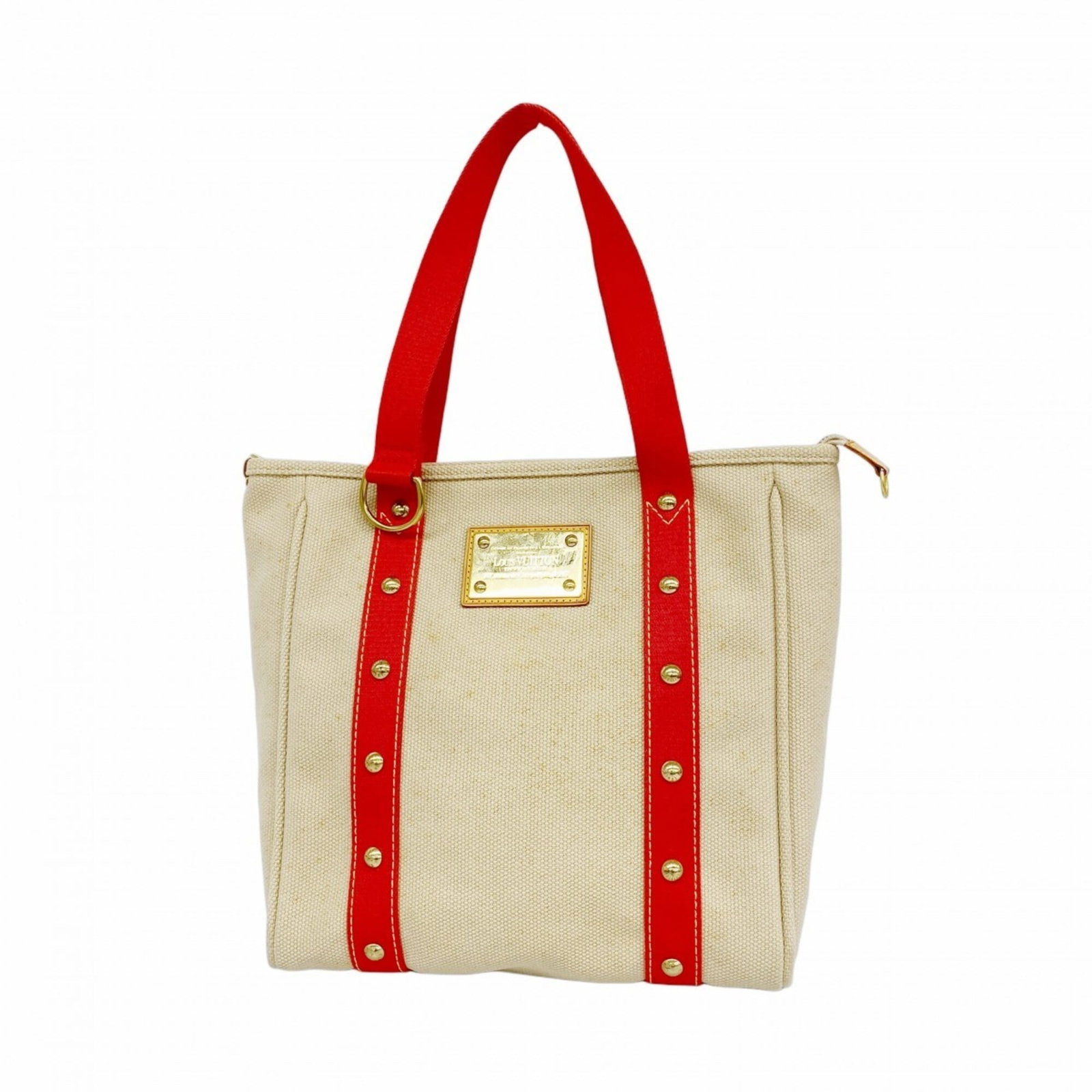 Louis Vuitton Tote Bag: Louis Vuitton Tote Bag Used Louis Vuitton Tote Bag in Beige Color. This classic tote bag features a timeless design with a 30cm x 29cm x 9cm size and traces of usage, scratches / dirt visible. The
