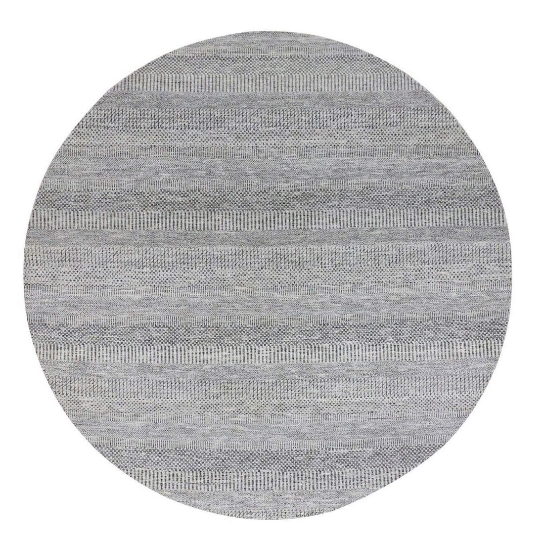 Bright Gray Hand Knot Grass Pure Round Wool Rug: Bright Gray Hand Knot Grass Pure Round Wool Rug Bright Gray Hand Knot Grass Pure Round Wool Rug features an Oriental design with a subtle regional flair from India. Made from high-quality wool and han