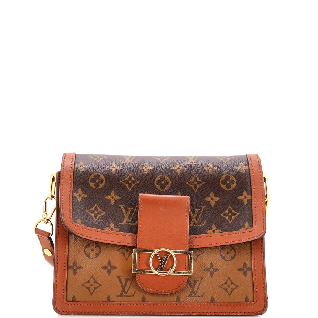 Shoulder Bag Louis Vuitton Canvas Dauphine Reverse Monogram: Shoulder Bag Louis Vuitton Canvas Dauphine Reverse Monogram The Louis Vuitton Canvas Dauphine Reverse Monogram Shoulder Bag features a classic design with a unique twist. This brown canvas bag boasts