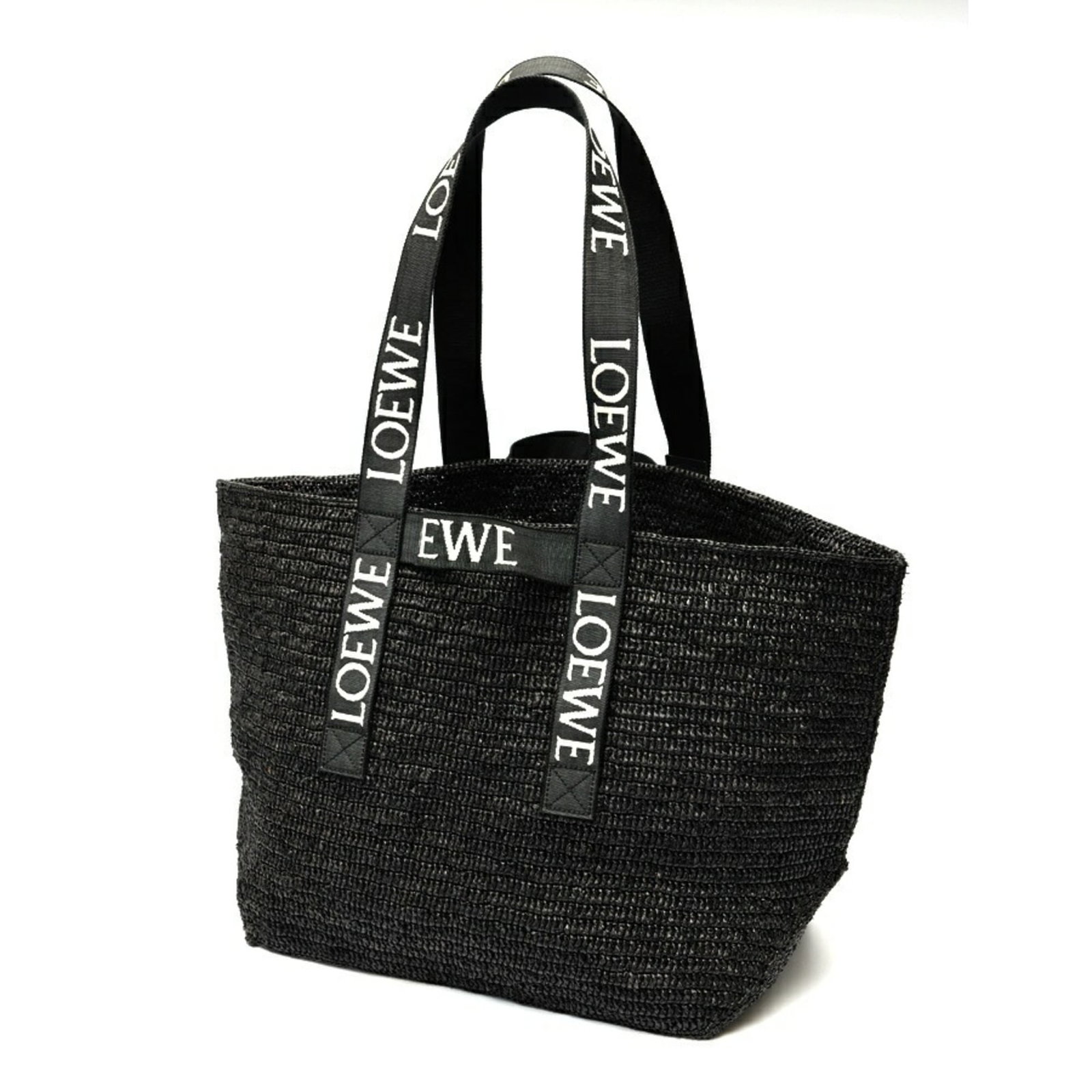 Loewe Tote Bag Raffia: Loewe Tote Bag Raffia Black Raffia Loewe Tote Bag with Traces of Usage. This used tote bag features a durable raffia material and measures 32cm x 50cm x 19cm. With its classic design, the bag showcase