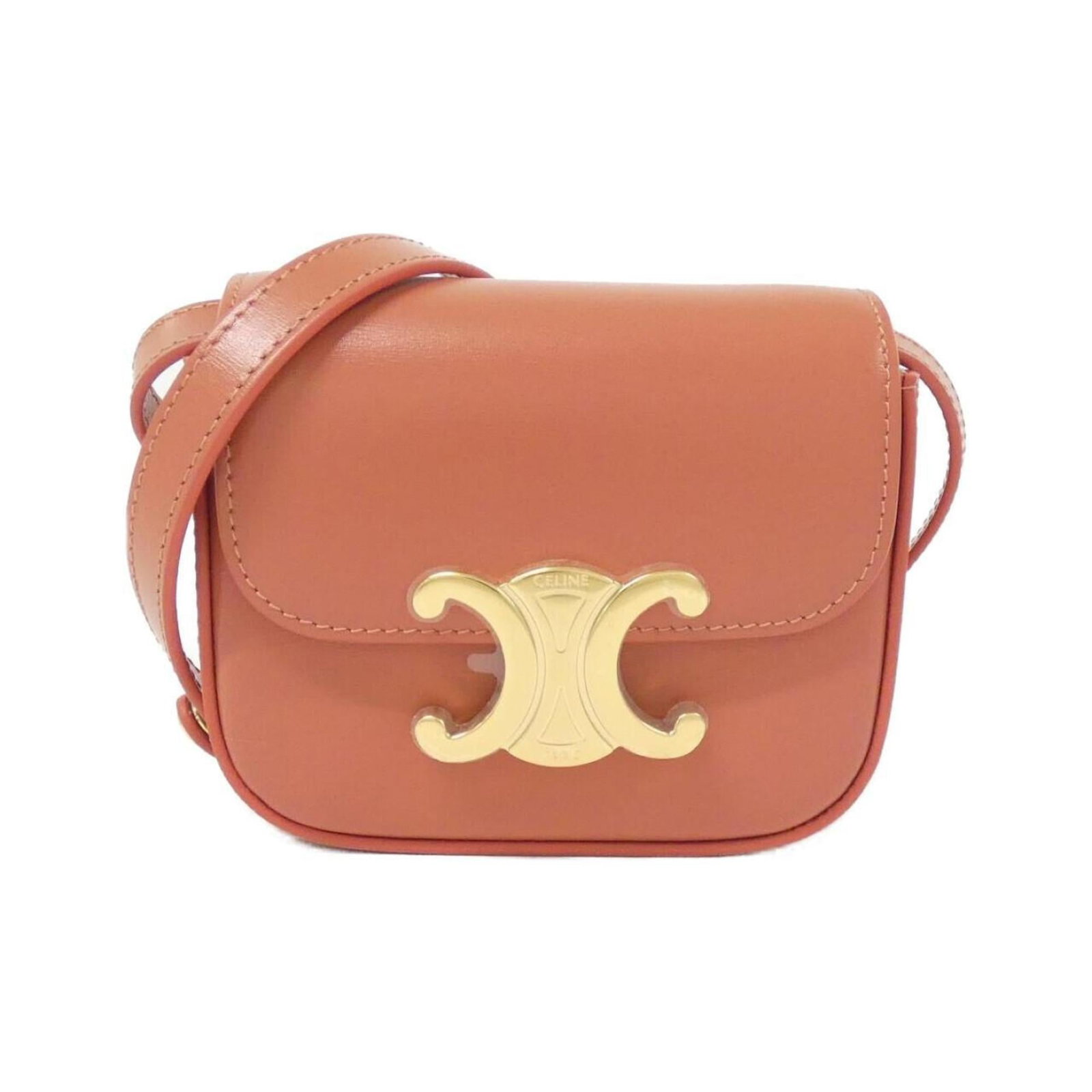 Celine Shoulder Bag Leather: Celine Shoulder Bag Leather The Celine Shoulder Bag Leather is a beautifully crafted, used bag with a rich beige and red brown color palette. Its calfskin leather construction exudes a luxurious