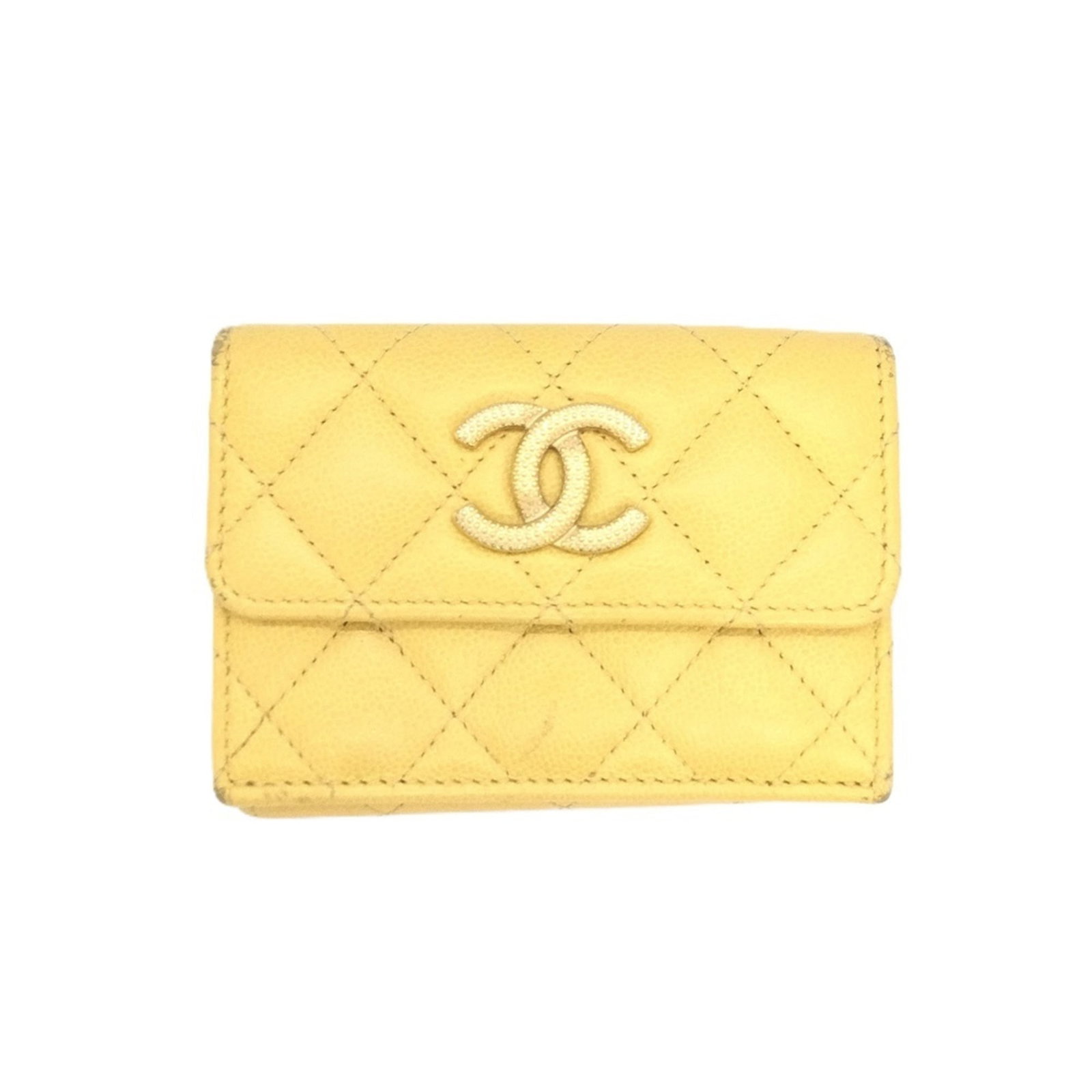 Chanel Wallet (Tri-Fold) Grained Calfskin: Chanel Wallet (Tri-Fold) Grained Calfskin Tri-fold wallet in vibrant yellow grained calfskin, a classic Chanel design. The tri-fold structure and smooth leather provide a timeless and versatile