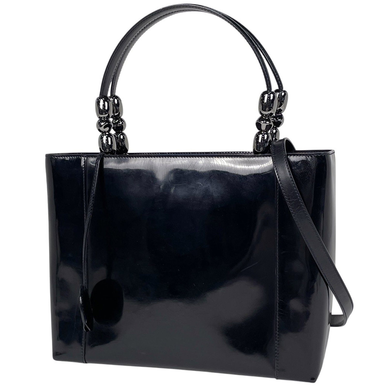 Christian Dior Handbag Patent Leather: Christian Dior Handbag Patent Leather The Christian Dior handbag boasts sleek patent leather exterior in classic black. Measuring 23cm x 29cm x 10cm, this stylish bag features a timeless design with