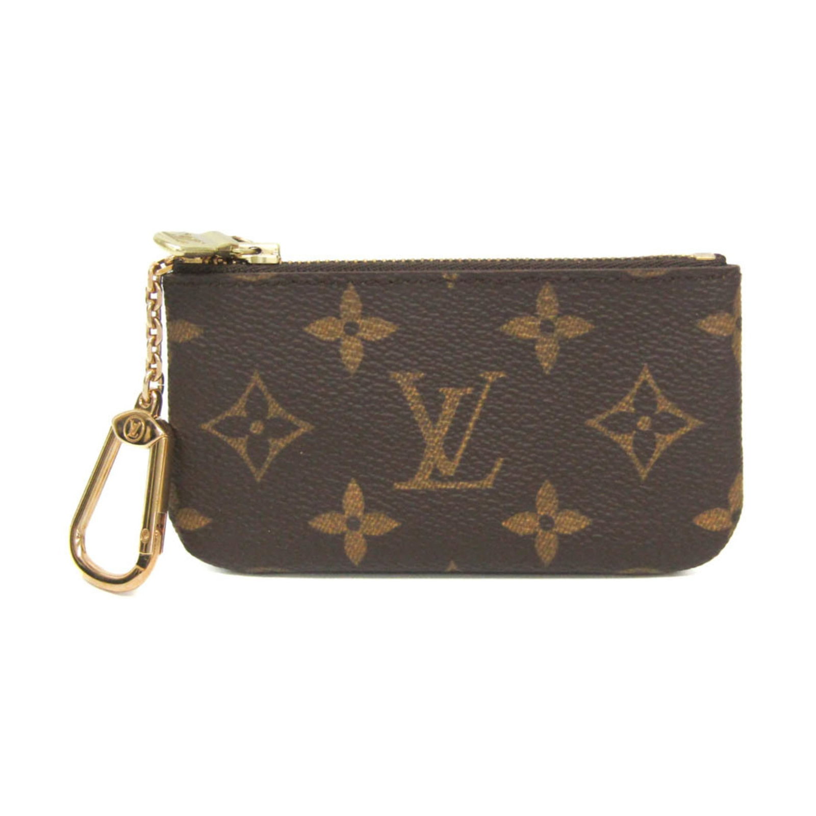 Louis Vuitton Coin Purse/Coin Case Monogram: Louis Vuitton Coin Purse/Coin Case Monogram Used Louis Vuitton Coin Purse/Coin Case Monogram in brown monogram with zipper closure. Features a chain strap of 10.5cm length and measures 6.5cm x 12cm.
