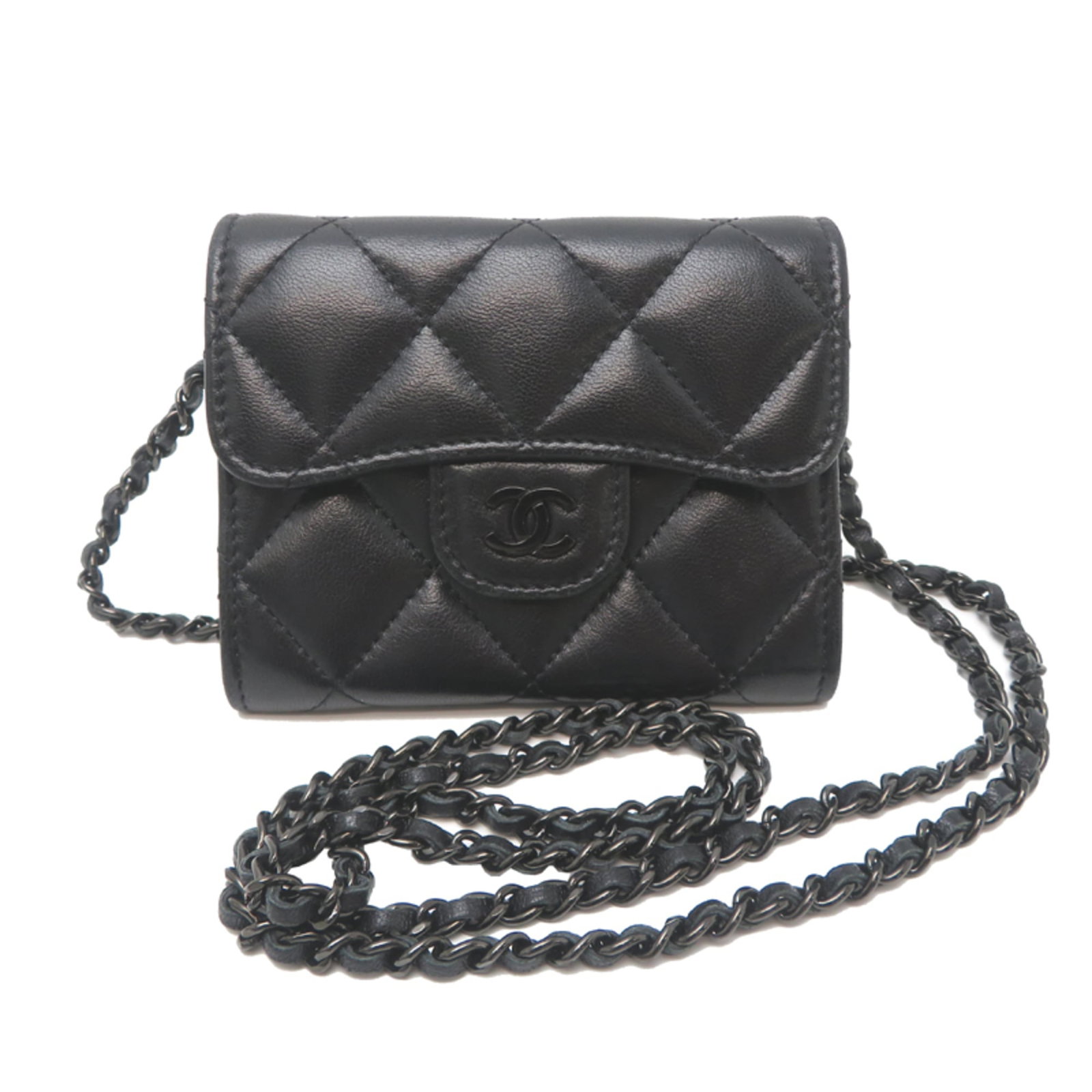 Chanel Chain/Shoulder Wallet Leather: Chanel Chain/Shoulder Wallet Leather The Chanel Chain/Shoulder Wallet Leather features a sleek and sophisticated design, showcasing high-quality lambskin material in black. With its classic chain