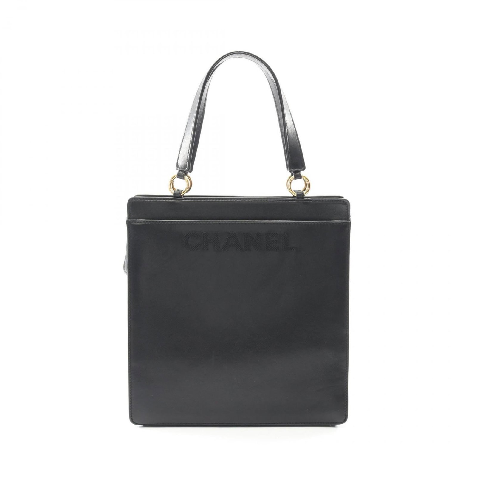Chanel Tote Bag Leather: Chanel Tote Bag Leather Black lambskin Chanel tote bag with gold hardware. This classic leather tote features a timeless design and premium materials, showcasing signs of gentle use. With its sleek bl