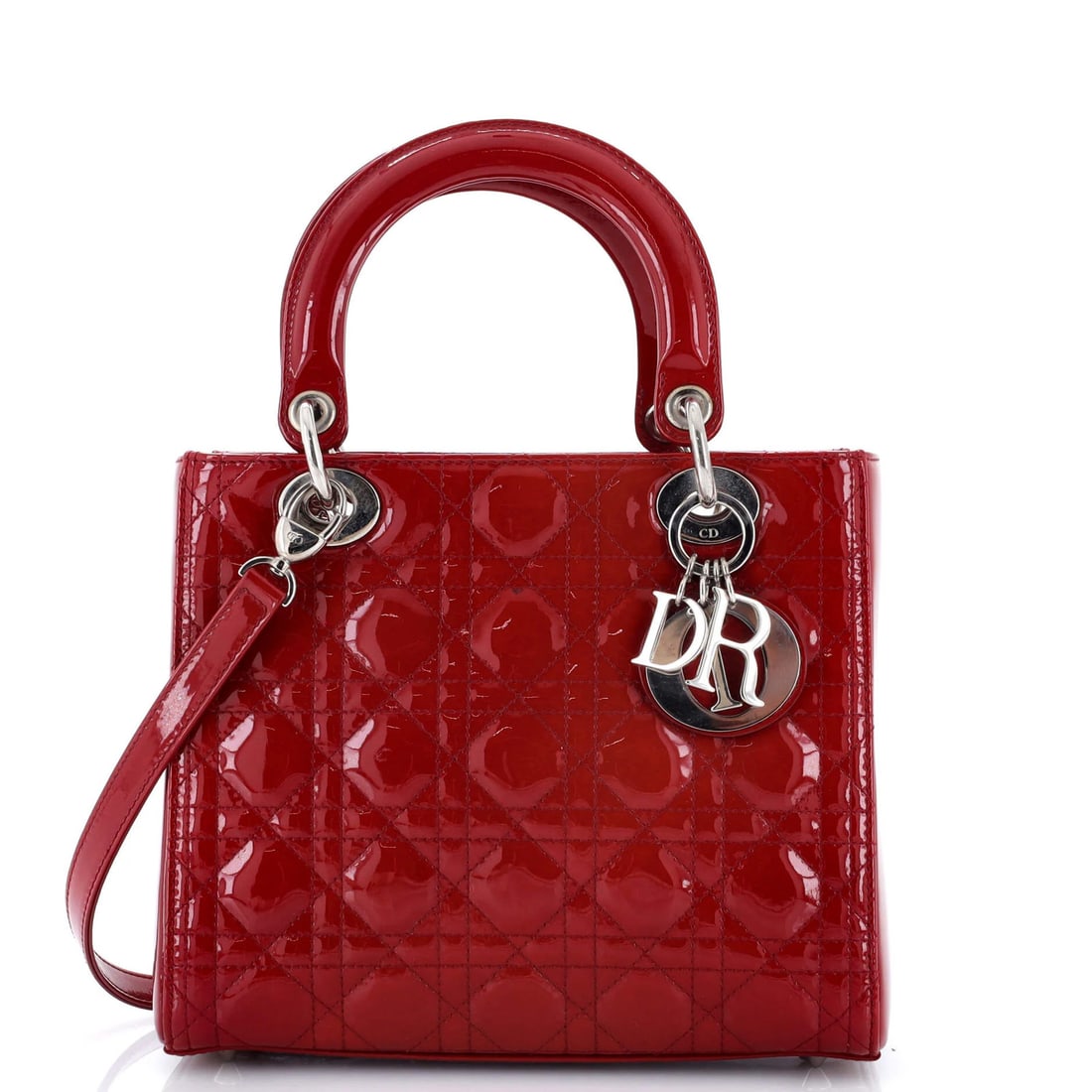Christian Dior Lady Dior Patent Quilt Medium Bag Cannage: Christian Dior Lady Dior Patent Quilt Medium Bag Cannage The Christian Dior Lady Dior Patent Quilt Medium Bag Cannage boasts striking patent leather exterior in vibrant red. This medium-sized bag feat
