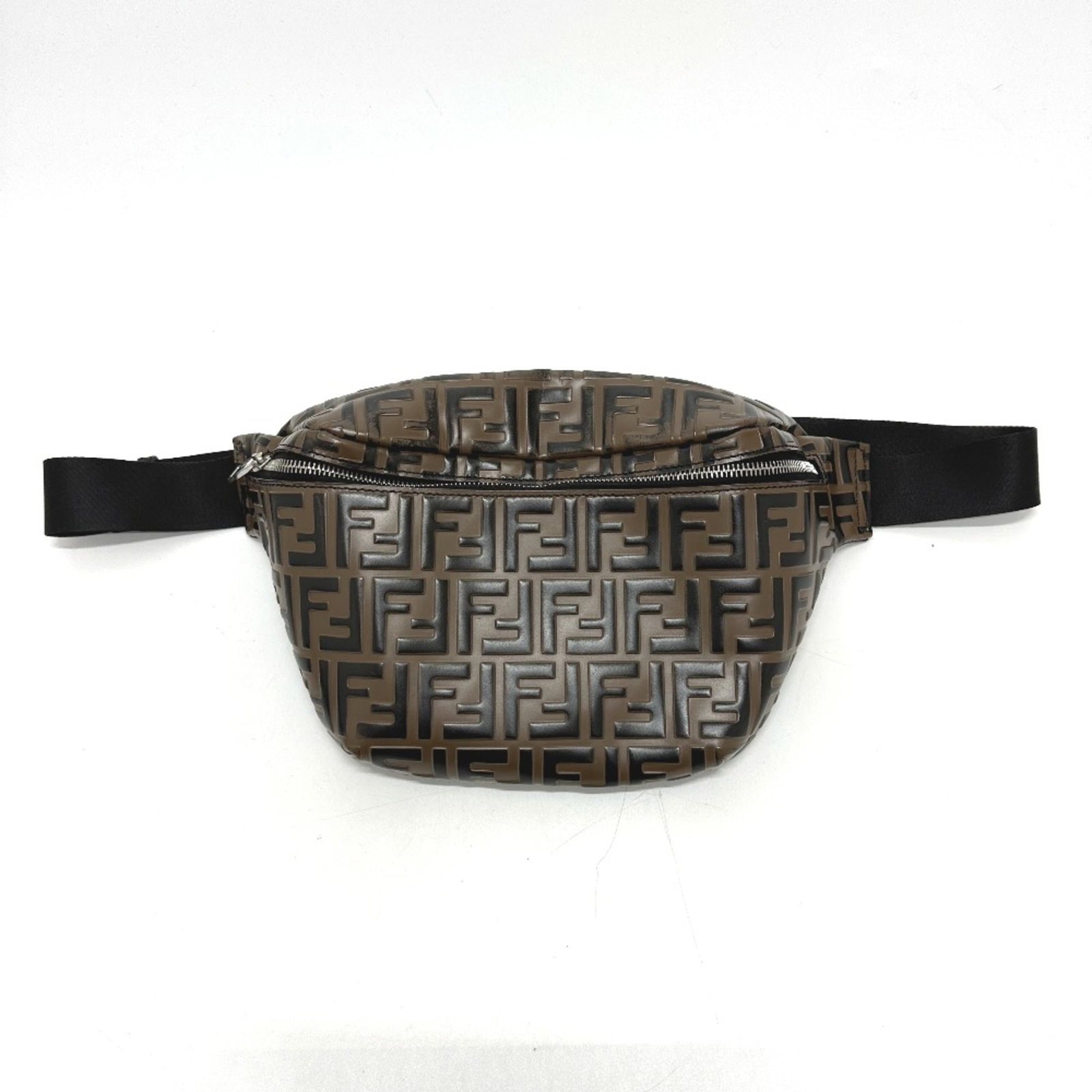 Fendi Other Leather: Fendi Other Leather Fendi Other Leather - A Timeless Brown Accessory. This Fendi leather accessory boasts a rich brown color and measures 18.5cm x 17.5cm x 3cm, making it a versatile addition to any c