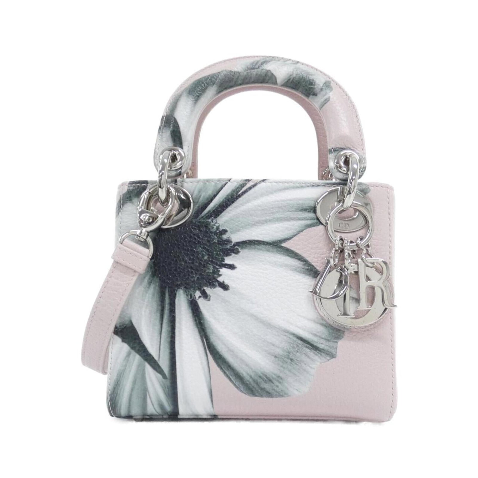 Christian Dior Handbag Leather: Christian Dior Handbag Leather The Christian Dior handbag features high-quality leather in a vibrant pink hue, complemented by silver hardware for a sleek and sophisticated look. With its compact