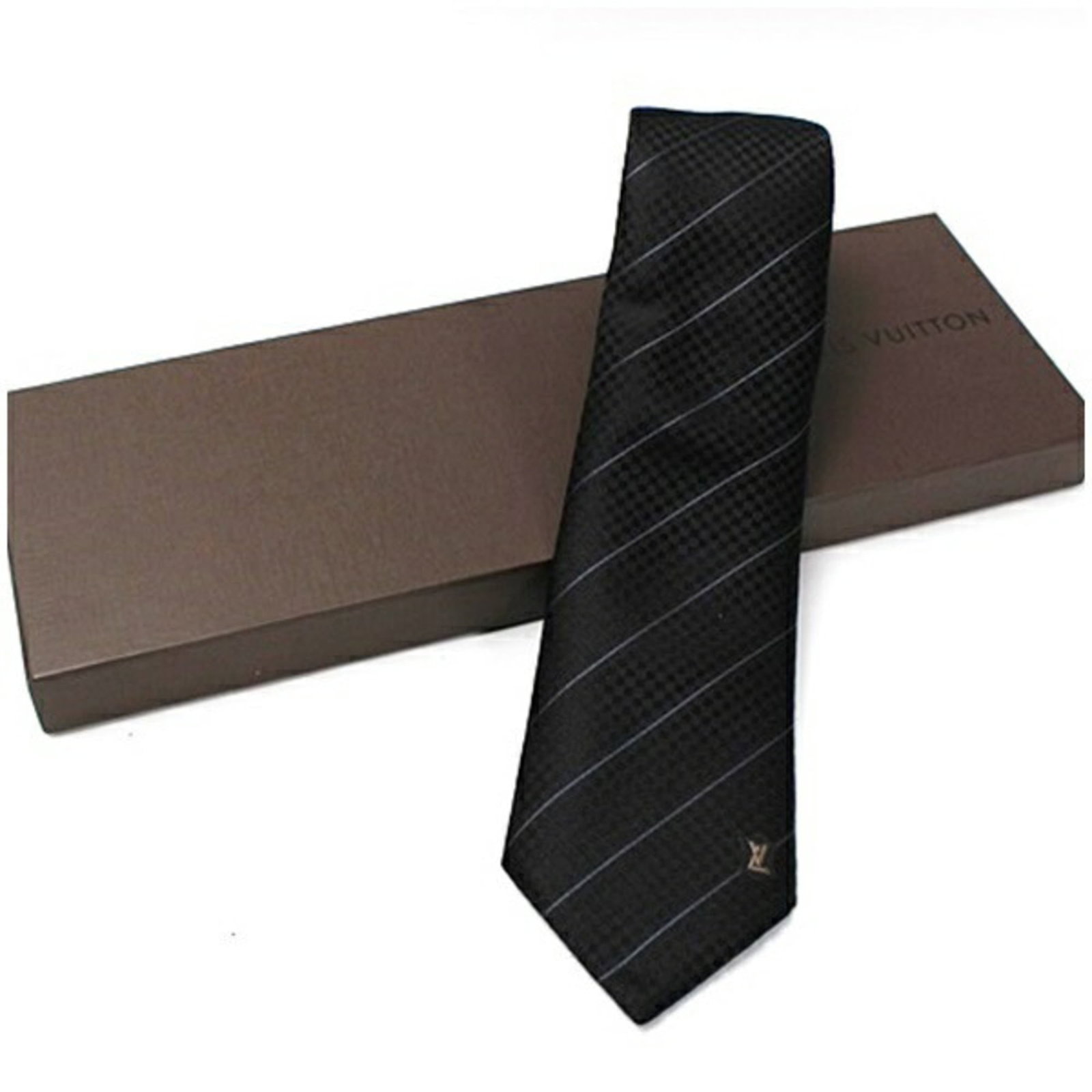 Louis Vuitton Cravat Silk: Louis Vuitton Cravat Silk Silk cravat with a classic Louis Vuitton design, available in black and gray. The cravat features a subtle sheen to its silk material and has undergone some wear, with minor 