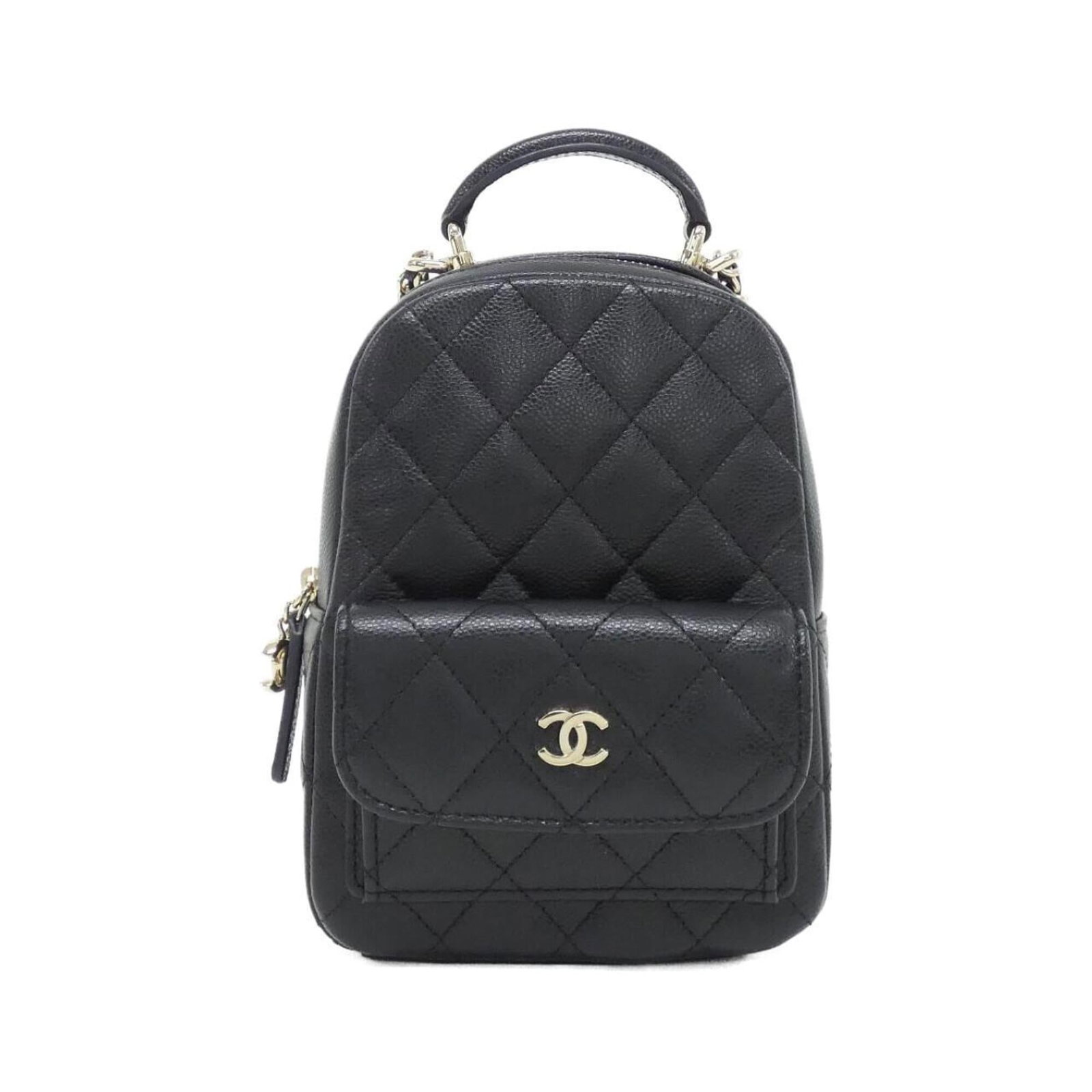 Chanel Backpack Grained Calfskin: Chanel Backpack Grained Calfskin Black Grained Calfskin Chanel Backpack in excellent condition. With its distinctive grain pattern and sleek design, this backpack showcases the iconic brand's timeless