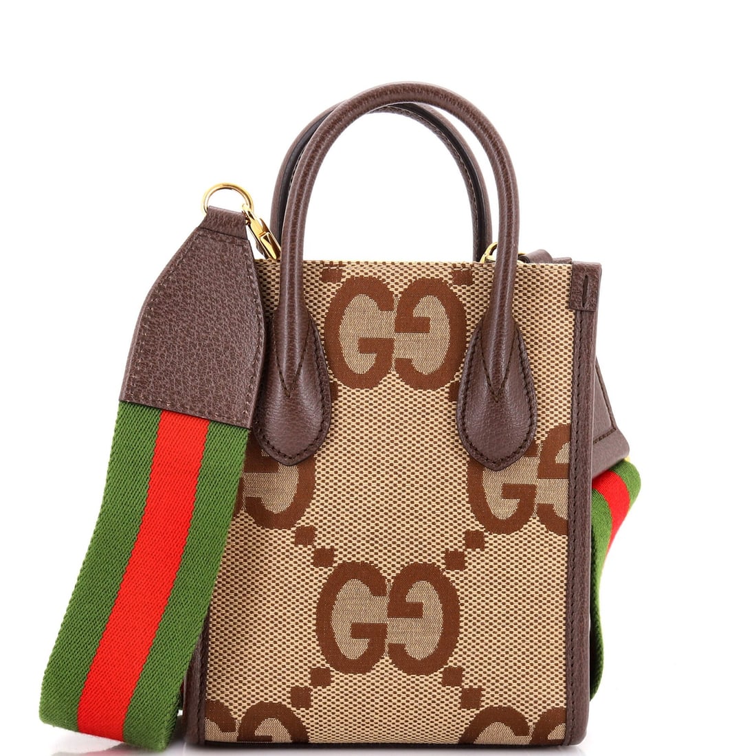 Gucci Canvas Vertical Jumbo Mini Tote: Gucci Canvas Vertical Jumbo Mini Tote Gucci's iconic canvas vertical jumbo mini tote boasts a timeless design with clean lines and classic style. Featuring a sturdy brown leather exterior and neutral 