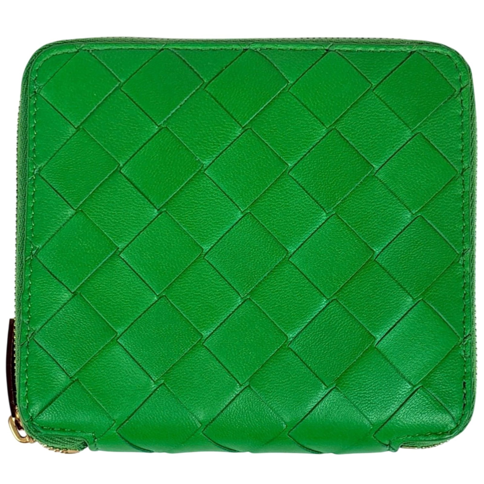 Bottega Veneta Wallet (Bi-Fold) Leather: Bottega Veneta Wallet (Bi-Fold) Leather This Bottega Veneta bi-fold wallet features a rich green leather exterior with subtle signs of wear. With its classic design and timeless style, this used walle