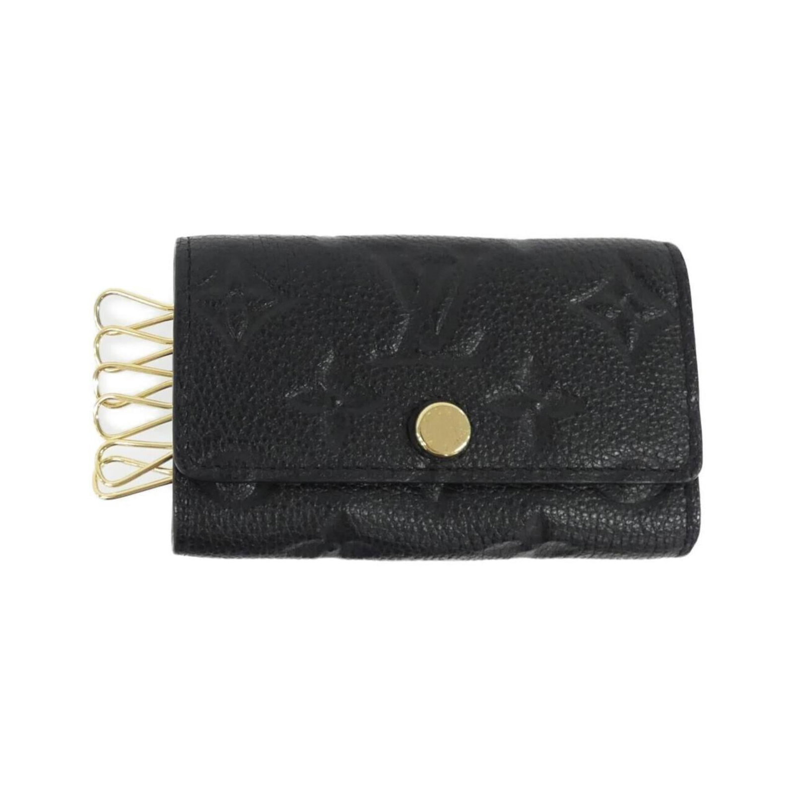 Louis Vuitton Keycase Leather: Louis Vuitton Keycase Leather This Louis Vuitton Keycase Leather is made from high-quality calf leather and features a sleek black finish. The item has some minor signs of usage, including scratches a