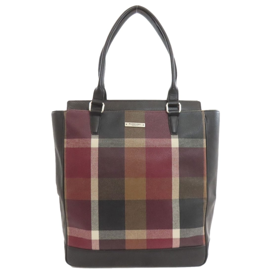 Check pattern bag tote leather made by Burberry: Check pattern bag tote leather made by Burberry Tote bag made from leather, featuring a check pattern in black, red, and brown. The bag's exterior material is of high quality leather, characteristic o