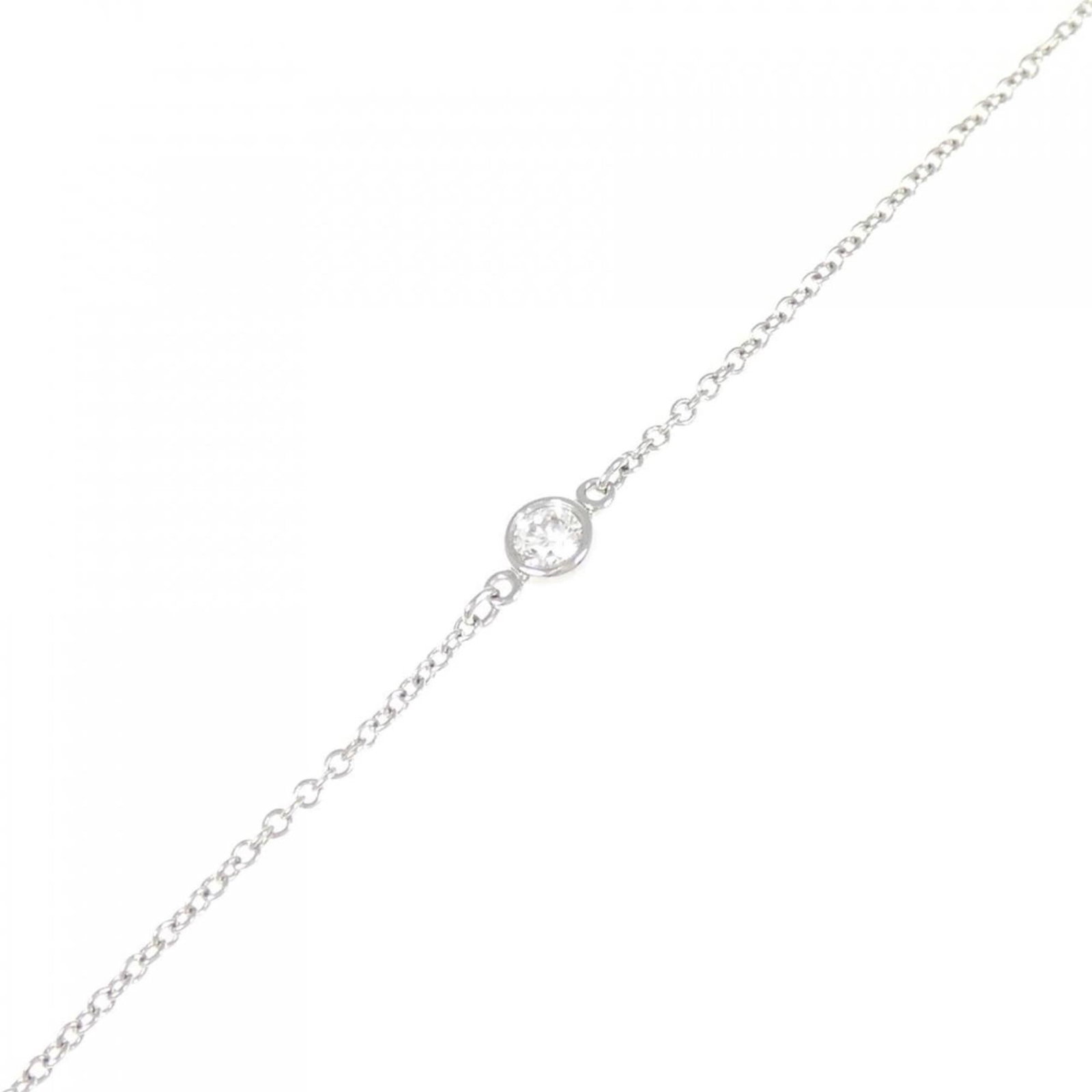 Tiffany Charm Bracelet Platinum 950: Tiffany Charm Bracelet Platinum 950 Platinum 950 Tiffany Charm Bracelet with Diamond Stone. This used charm bracelet features a diamond stone and is made from high-quality platinum 950 material. With