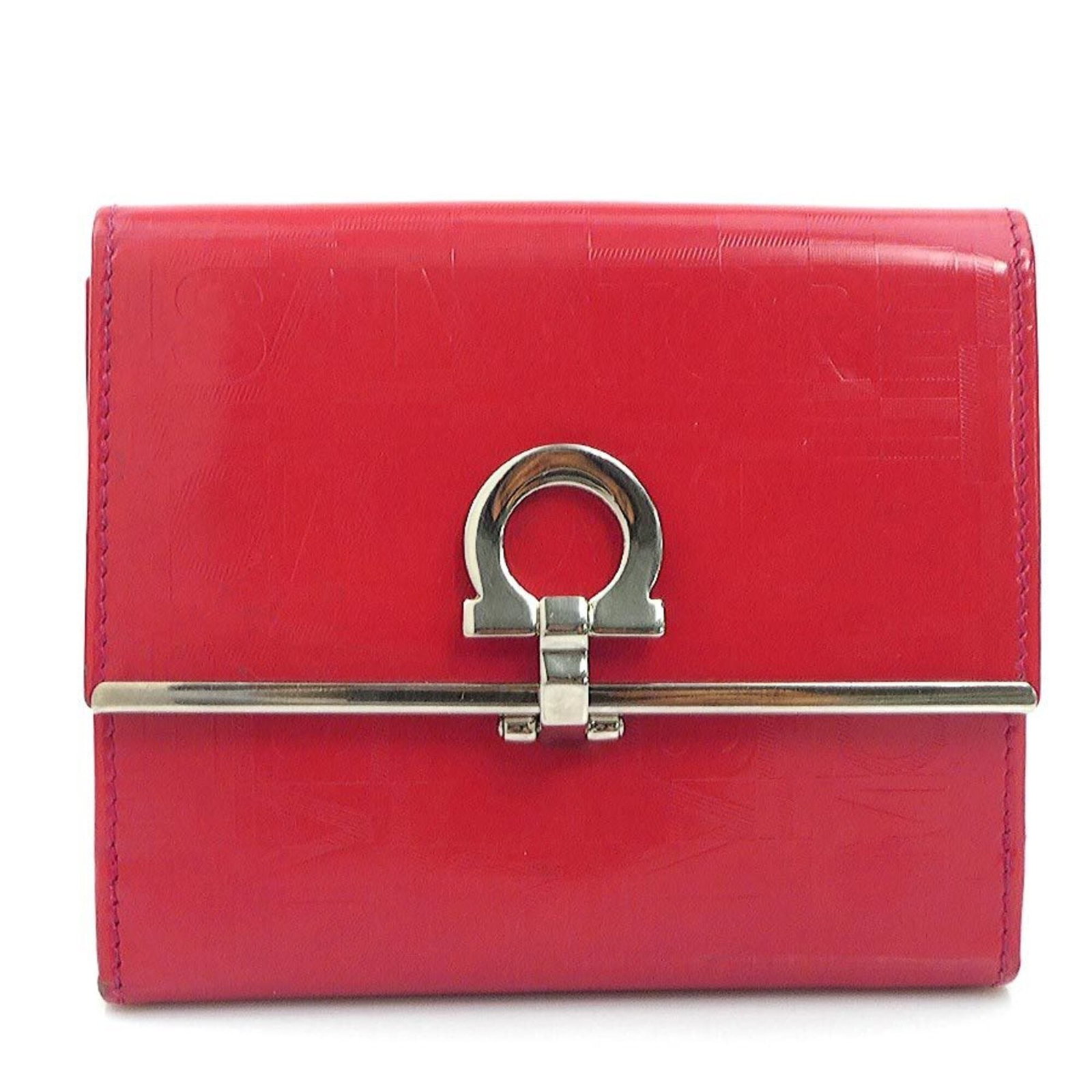 Salvatore Ferragamo Wallet (Bi-Fold) Leather: Salvatore Ferragamo Wallet (Bi-Fold) Leather The Salvatore Ferragamo bi-fold wallet in red leather offers a classic and sophisticated design. With its durable construction and timeless style, this