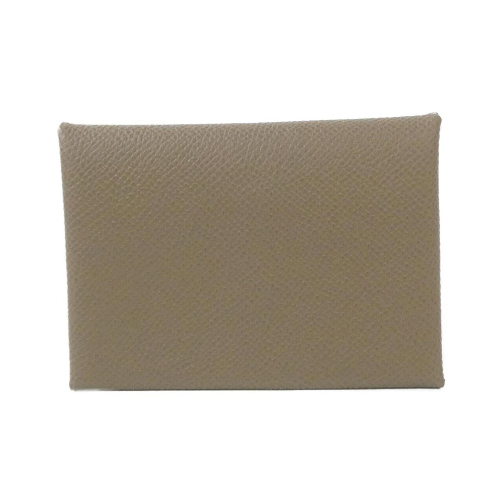 Hermes Coin Purse/Coin Case Epsom Leather: Hermes Coin Purse/Coin Case Epsom Leather Epsom leather coin purse with classic design, bearing a signature. This used Hermes coin case features a timeless etoupe gray color and measures 7cm x 10.5cm 