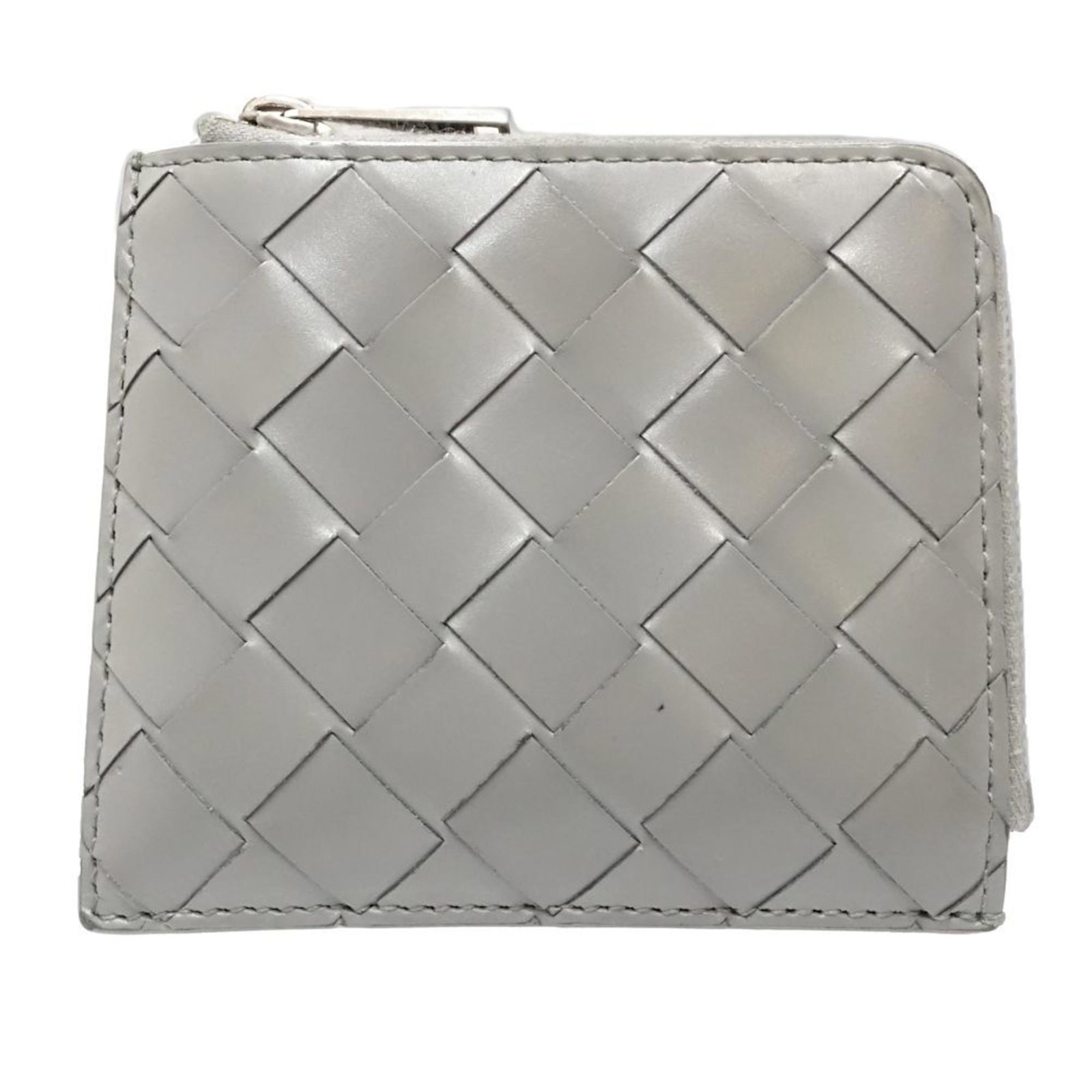 Bottega Veneta Coin Purse/Coin Case Intrecciato: Bottega Veneta Coin Purse/Coin Case Intrecciato The Bottega Veneta Coin Purse/Coin Case Intrecciato boasts a timeless design with its iconic Intrecciato weave pattern, adding an air of sophistication 