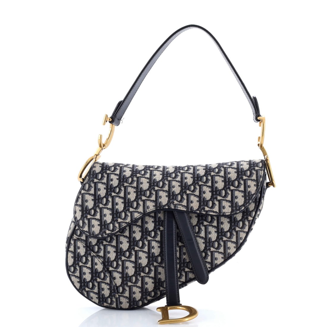 Canvas oblique medium saddle handbag Christian Dior: Canvas oblique medium saddle handbag Christian Dior Canvas oblique medium saddle handbag in blue from Christian Dior features a classic shoulder bag design with an oblique canvas material and gold