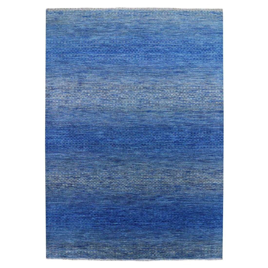 Blue pure wool hand knotted modern chiaroscuro collection rug 103 x 144: Blue pure wool hand knotted modern chiaroscuro collection rug 103 x 144 The Blue pure wool hand knotted modern chiaroscuro collection rug boasts a striking rectangular field with intricate blue and gr