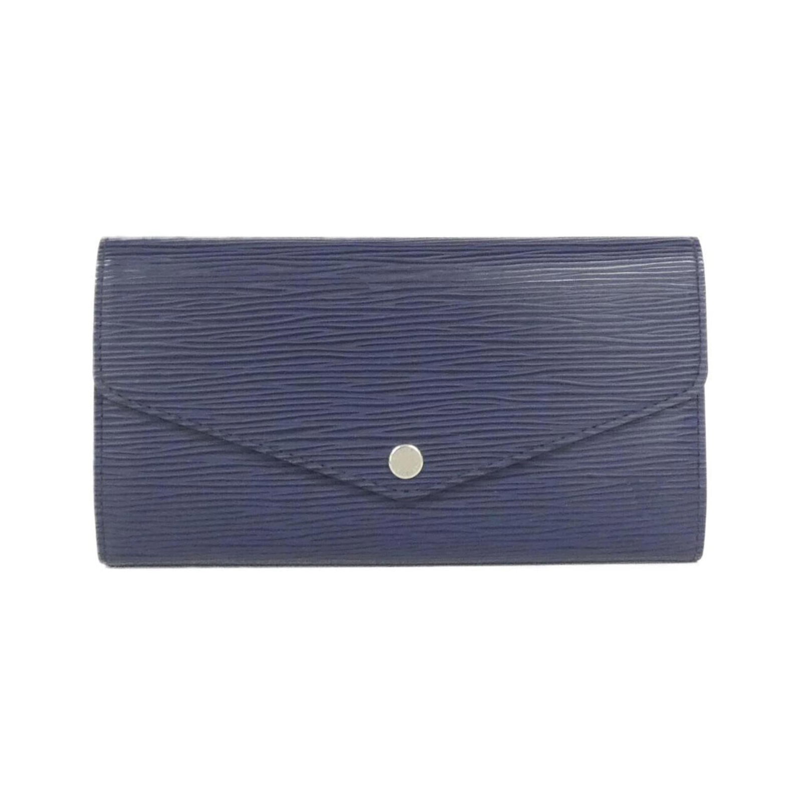 Louis Vuitton Long Wallet (Bi-Fold) Leather: Louis Vuitton Long Wallet (Bi-Fold) Leather Bi-fold design for a classic look, this Louis Vuitton long wallet features indigo calf leather and measures 10cm x 19cm x 2cm. With some traces of usage vis