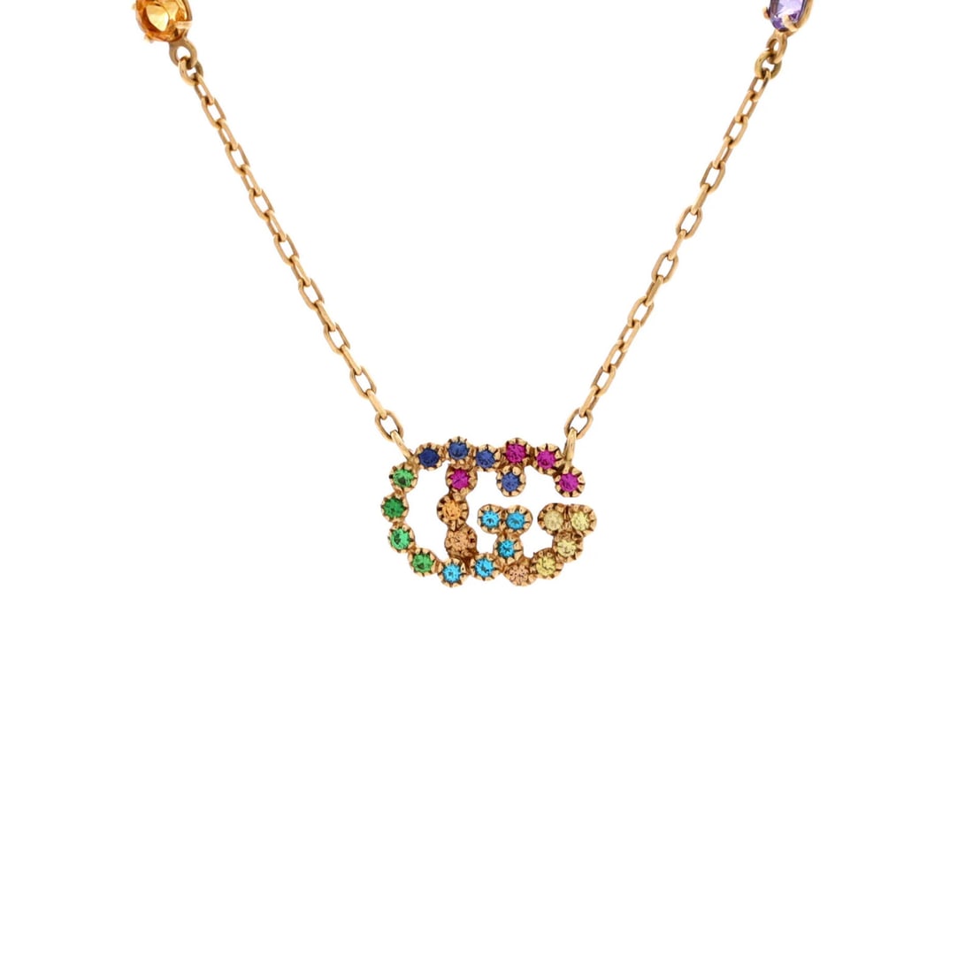 Yellow Gold Necklace with Topaz and Quartz: Yellow Gold Necklace with Topaz and Quartz 18K Yellow Gold Gucci Main Stone Necklace with Topaz and Quartz features a unique combination of topaz, quartz, tsavorite, and sapphire. The necklace boasts 