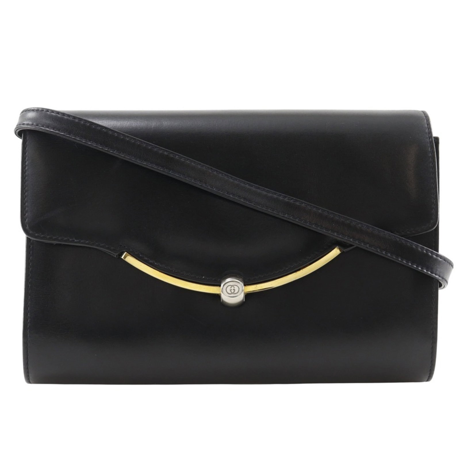 Gucci Shoulder Bag Leather: Gucci Shoulder Bag Leather Gucci's iconic shoulder bag features a sleek black calfskin leather exterior with a classic flap closure and zipper pocket. The bag measures 15cm x 22cm x 4cm and weighs 350