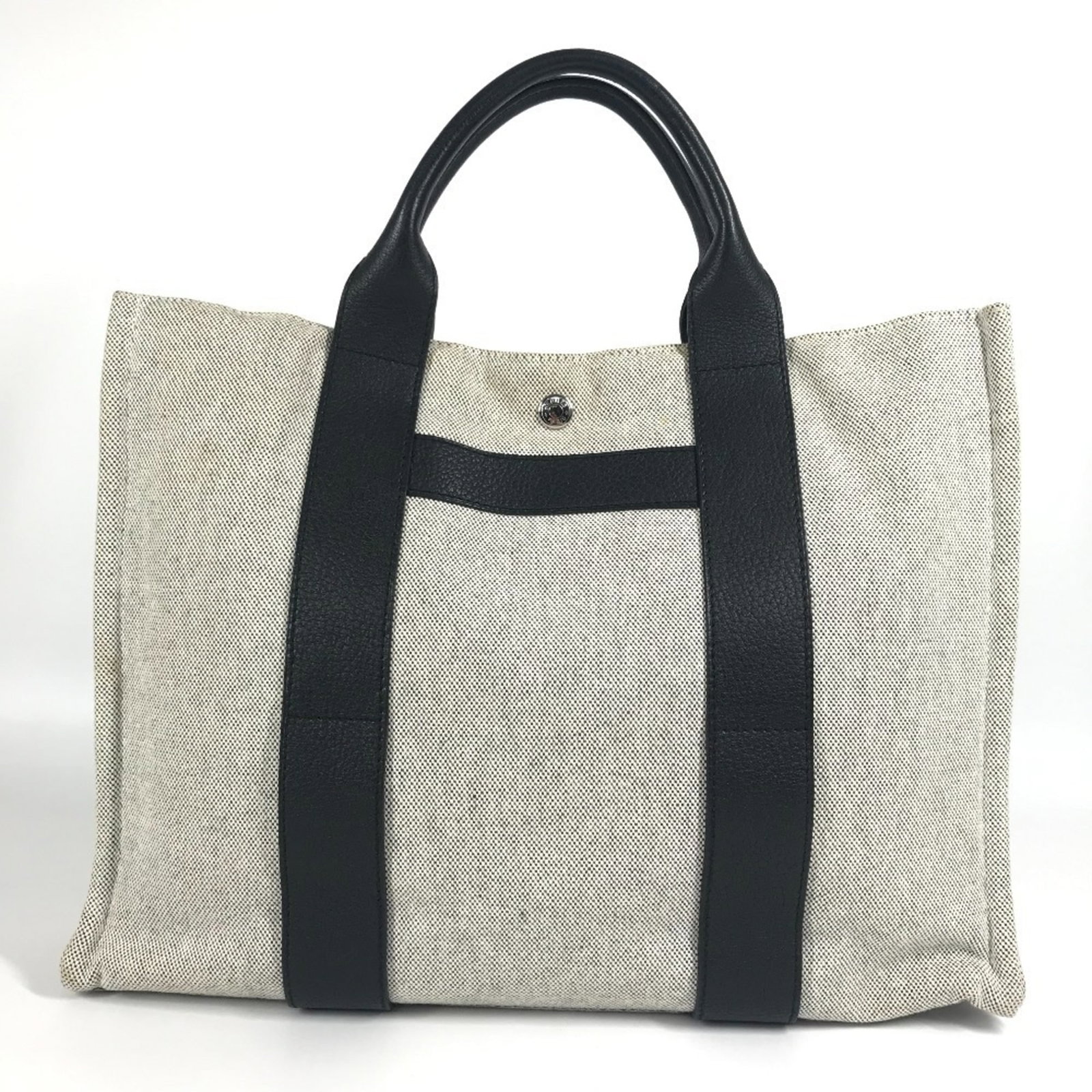 Hermes Handbag Tote Bag Toile H Leather: Hermes Handbag Tote Bag Toile H Leather Toile H leather adds an iconic touch to this classic Hermes tote bag. With its timeless design and versatile black and gray color palette, this bag is perfect f