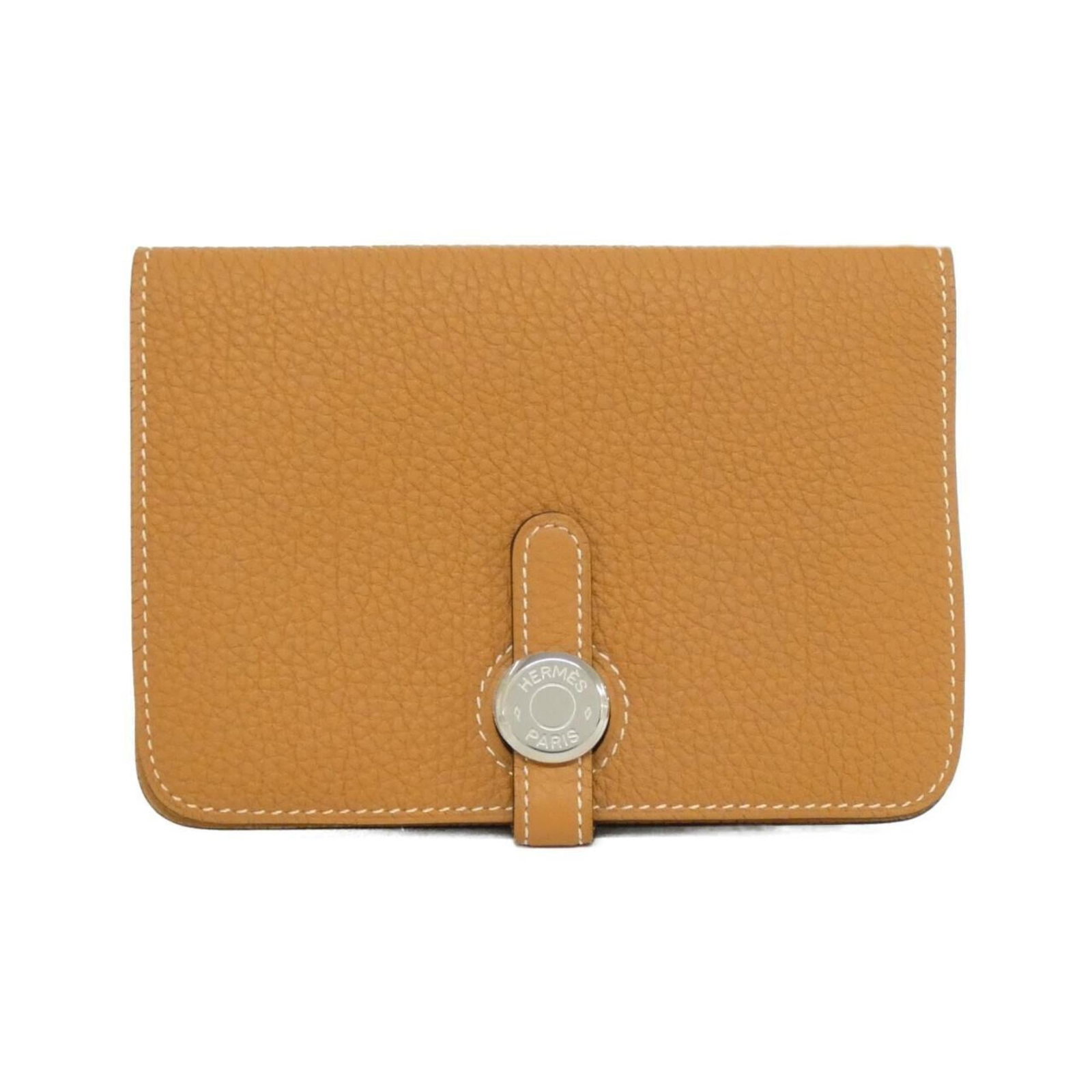 Hermes Wallet (Bi-Fold) Togo Leather: Hermes Wallet (Bi-Fold) Togo Leather Toffee-colored Togo leather wraps around this classic bi-fold wallet from Hermes, its subtle sheen hinting at years of gentle use. A few faint scratches and