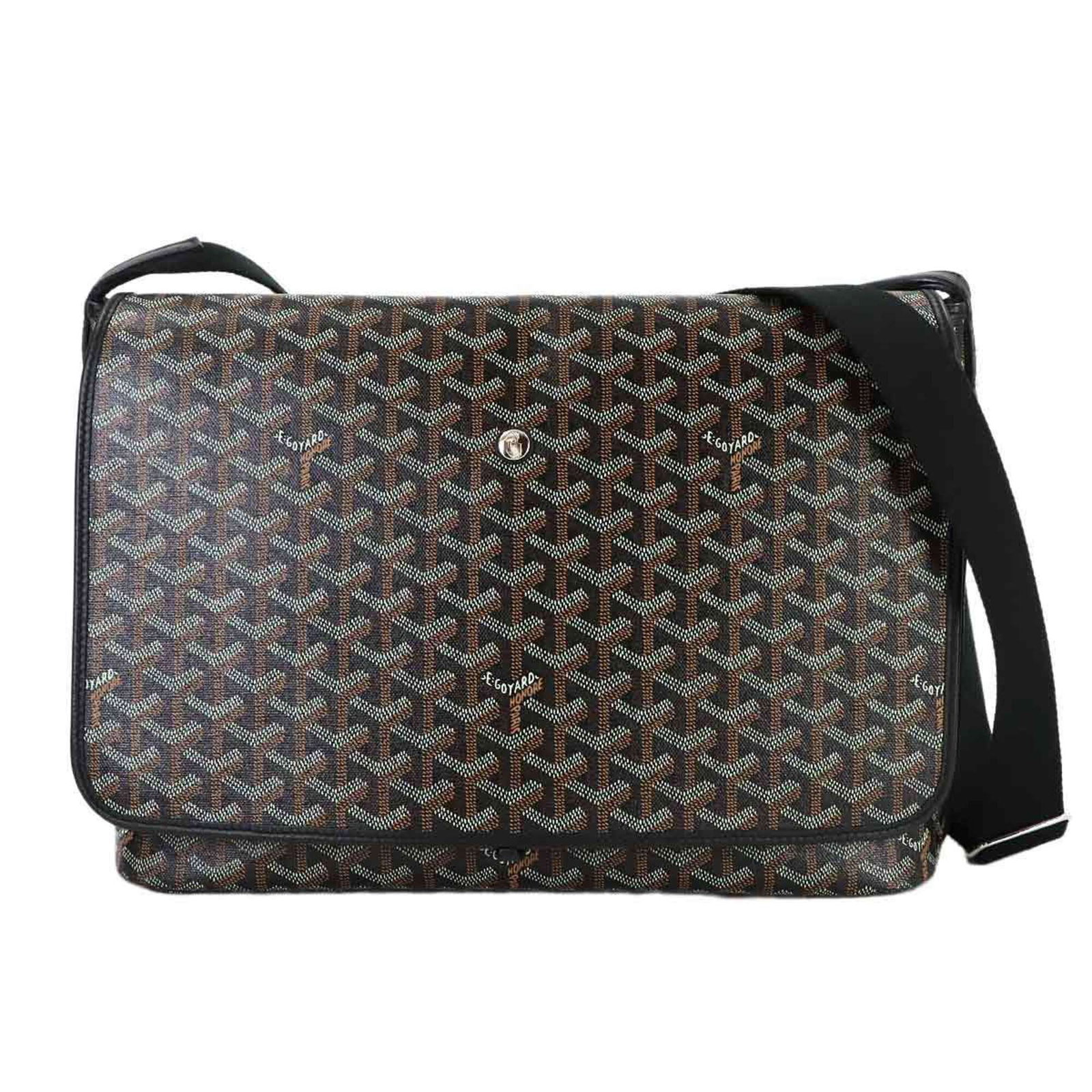 Goyard Handbag Shoulder Bag Pvc Leather: Goyard Handbag Shoulder Bag Pvc Leather The Goyard Handbag Shoulder Bag features a sleek black design with silver hardware and open pockets for added convenience. Made from high-quality pvc leather, t
