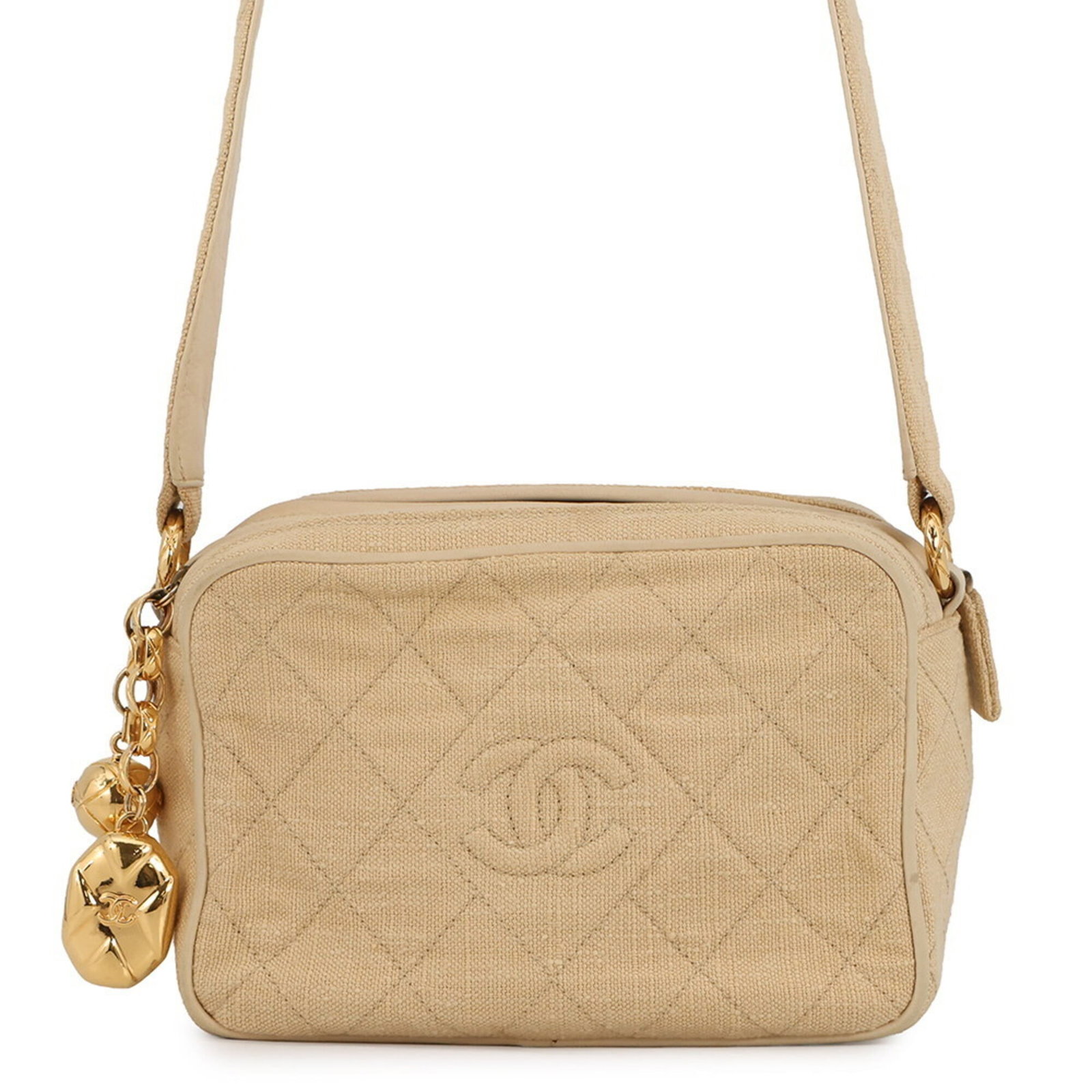 Chanel Shoulder Bag Canvas Leather: Chanel Shoulder Bag Canvas Leather Canvas and leather combine in this classic Chanel shoulder bag, featuring a timeless beige color. The bag's canvas and leather construction gives it a durable and st