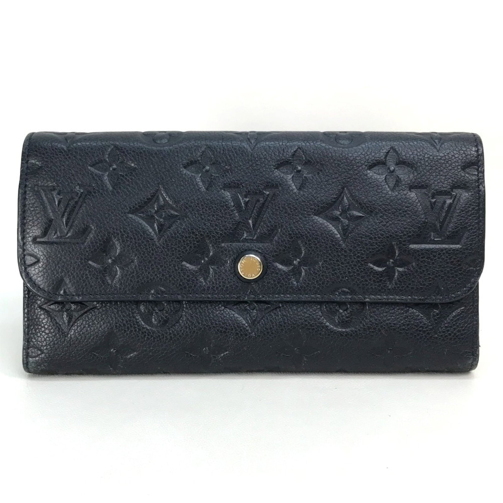 Louis Vuitton Long Wallet (Bi-Fold) Monogram Empreinte: Louis Vuitton Long Wallet (Bi-Fold) Monogram Empreinte The Louis Vuitton Long Wallet (Bi-Fold) Monogram Empreinte features the iconic brand's signature monogram pattern in Infini and Navy hues. With