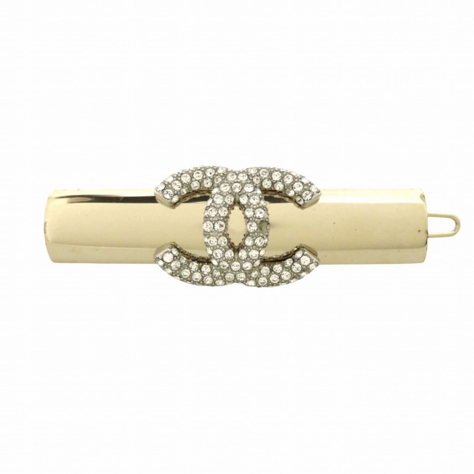 Chanel Barrette Alloy: Chanel Barrette Alloy Chanel Barrette Alloy features an alloy base with a rhinestone charm, measuring 1.9cm x 1cm in size. The item has traces of usage and minor scratches/dirt, indicating it's been