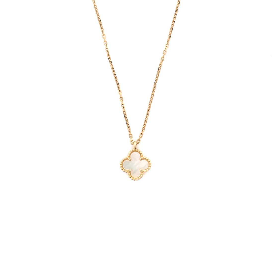 Sweet Alhambra Pendant Necklace 18K Gold Mother of Van Cleef Arpels: Sweet Alhambra Pendant Necklace 18K Gold Mother of Van Cleef Arpels The Sweet Alhambra Pendant Necklace showcases 18K yellow gold and mother of pearl in elegant harmony. This exquisite piece measures 