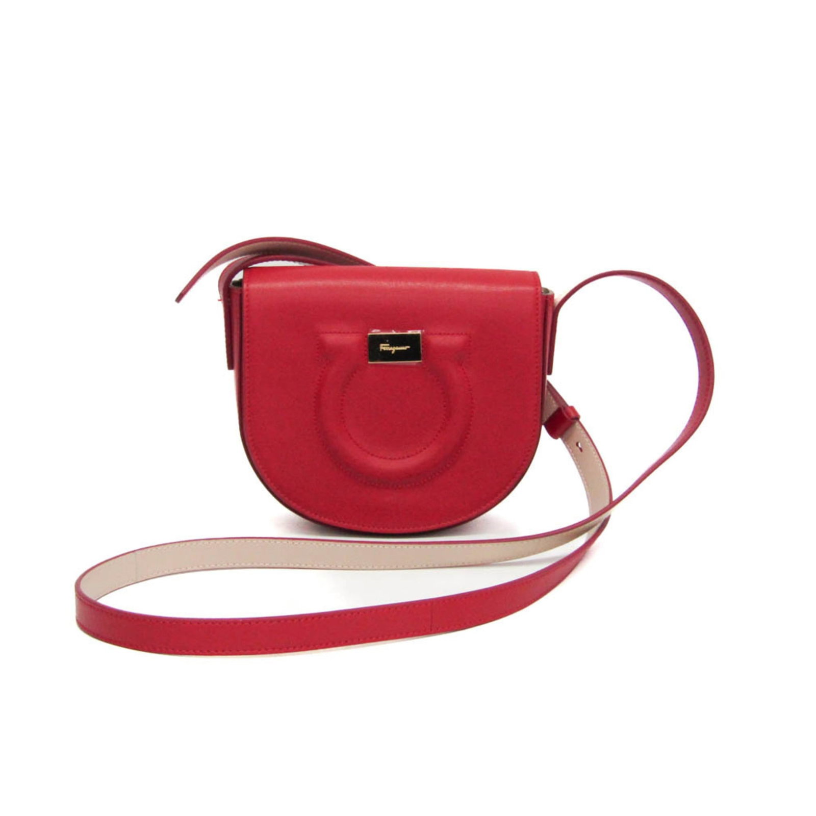 Salvatore Ferragamo Shoulder Bag Leather: Salvatore Ferragamo Shoulder Bag Leather This Salvatore Ferragamo shoulder bag boasts sleek red leather and a magnetic snap closure. With an inner card holder and spacious interior, it's perfect for d