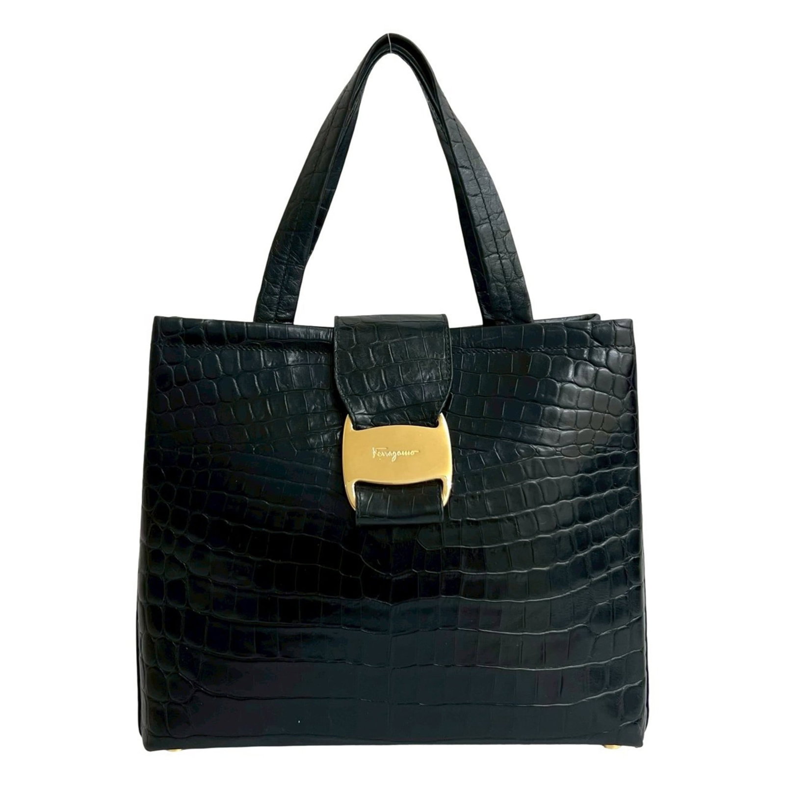Salvatore Ferragamo Handbag Tote Bag Leather: Salvatore Ferragamo Handbag Tote Bag Leather Salvatore Ferragamo's iconic leather tote bag exudes timeless elegance with its sleek black design. The bag's classic shape and premium leather