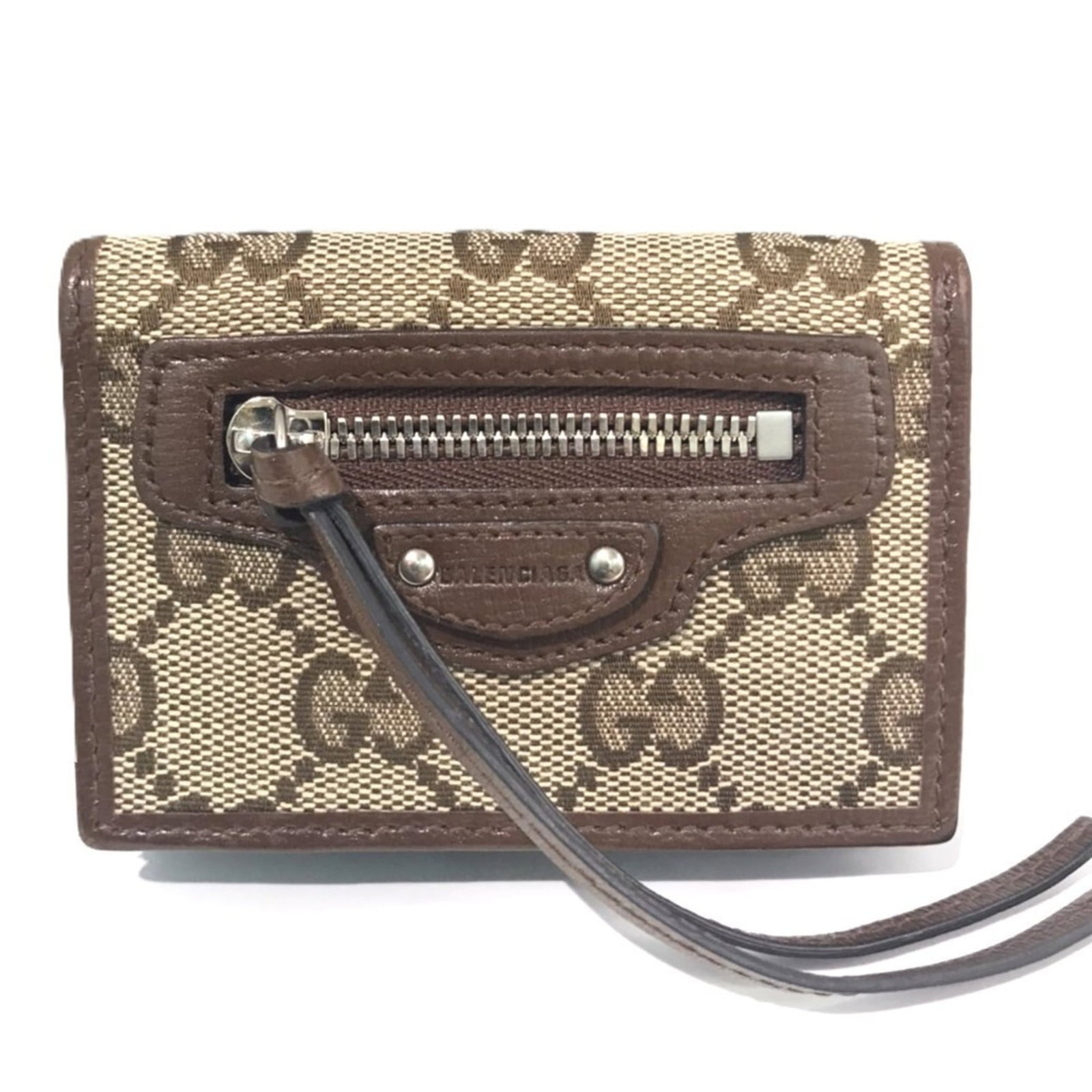 Gucci Wallet (Tri-Fold) Canvas Leather: Gucci Wallet (Tri-Fold) Canvas Leather Gucci's iconic tri-fold wallet features canvas and leather construction, offering a stylish and functional design. This used wallet shows some signs of wear, wit
