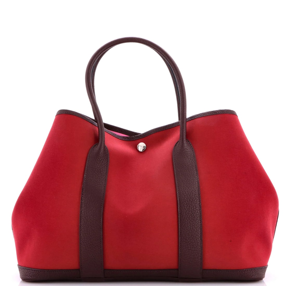 Toile Tote Garden Hermes 36 Leather: Toile Tote Garden Hermes 36 Leather The Toile Tote Garden Hermes 36 Leather features a striking red exterior with canvas plain leather accents and a pink interior. This classic tote boasts a timeless