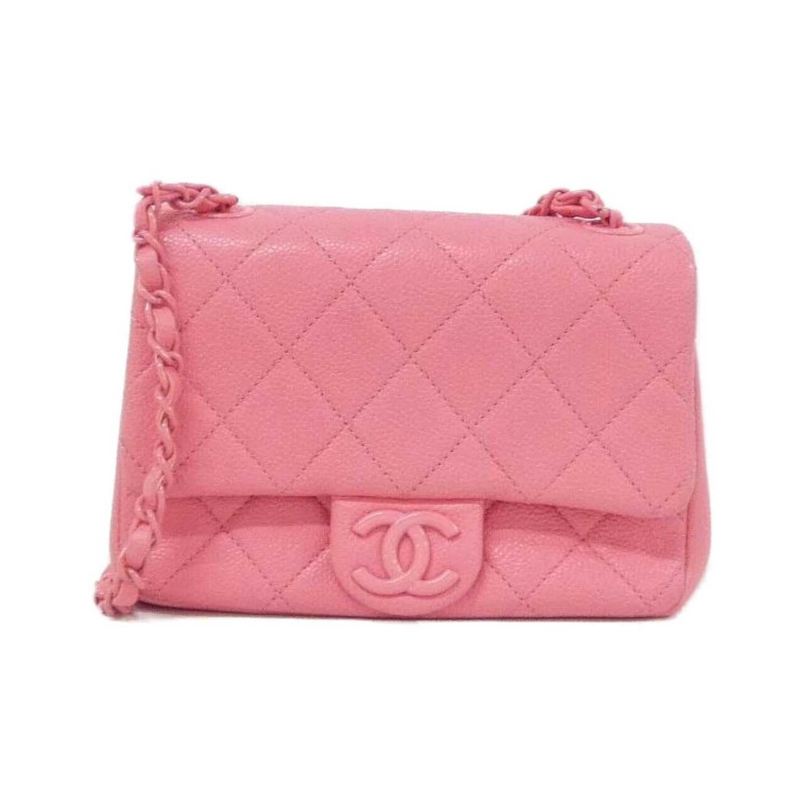 Chanel Shoulder Bag Grained Calfskin: Chanel Shoulder Bag Grained Calfskin Chanel's iconic shoulder bag features a timeless design in grained calfskin, with a soft pink hue that adds a touch of elegance. The subtle scratches and minor dir