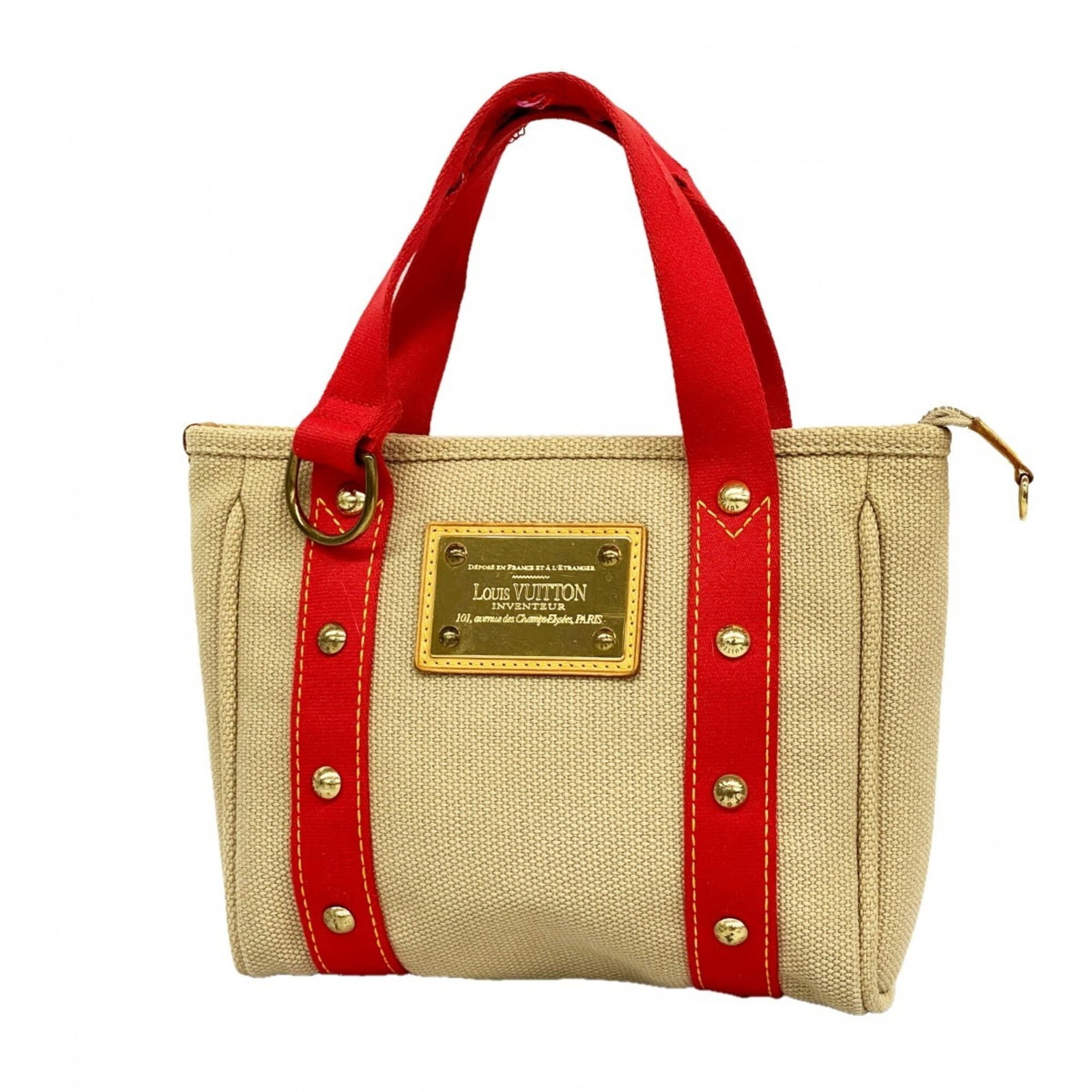 Louis Vuitton Handbag: Louis Vuitton Handbag Used Louis Vuitton Beige Handbag with Traces of Usage. This 20cm x 23cm x 5cm handbag has scratches and dirt visible, but remains in good condition. The iconic Louis Vuitton desi